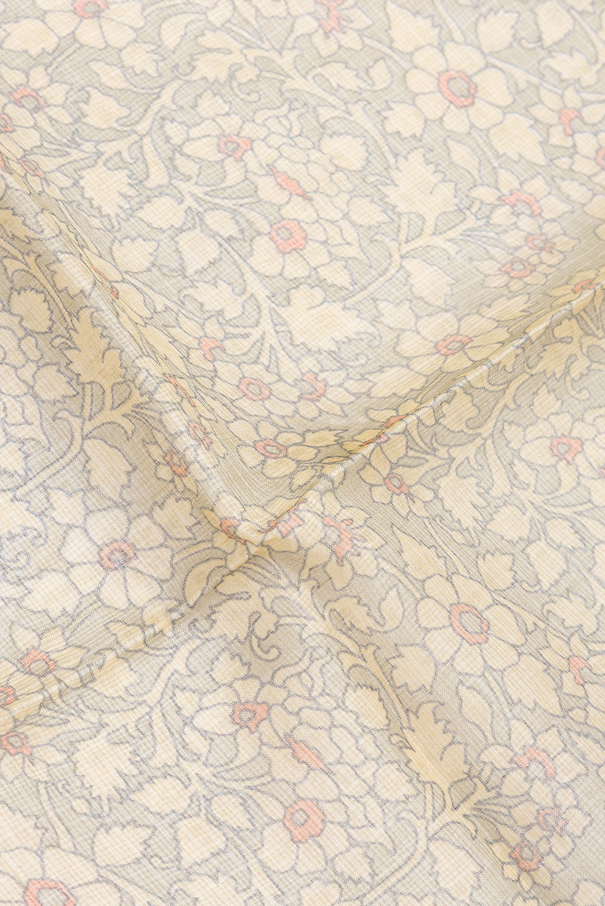 Close up of Sandal Dual Tone Kota Silk Saree with Printed design on the body and Zari Border.  displaying folds