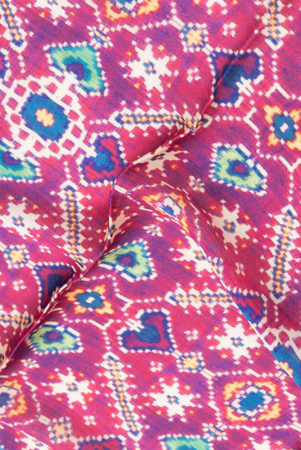 Close up of Purple Dual Tone Mysore Crepe Saree with Printed design on the body and Printed Border.  displaying folds