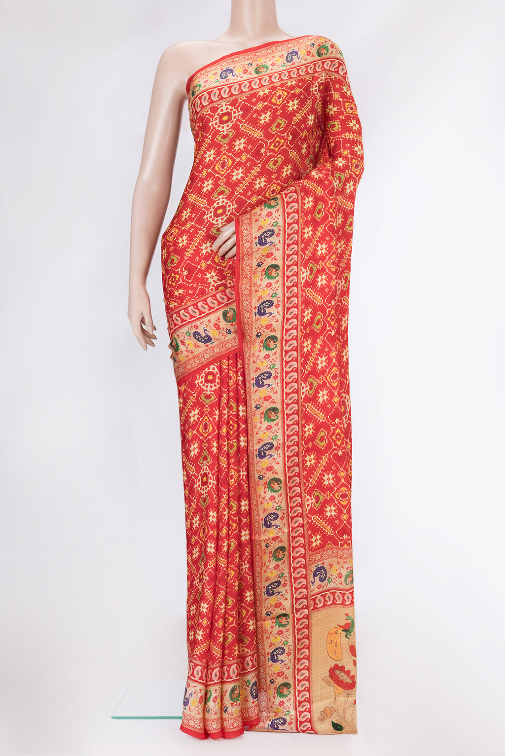 Red Dual Tone Mysore Crepe Saree with Printed design on the body and Printed Border.  displayed on a mannequin