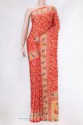 Red Dual Tone Mysore Crepe Saree with Printed design on the body and Printed Border.  displayed on a mannequin