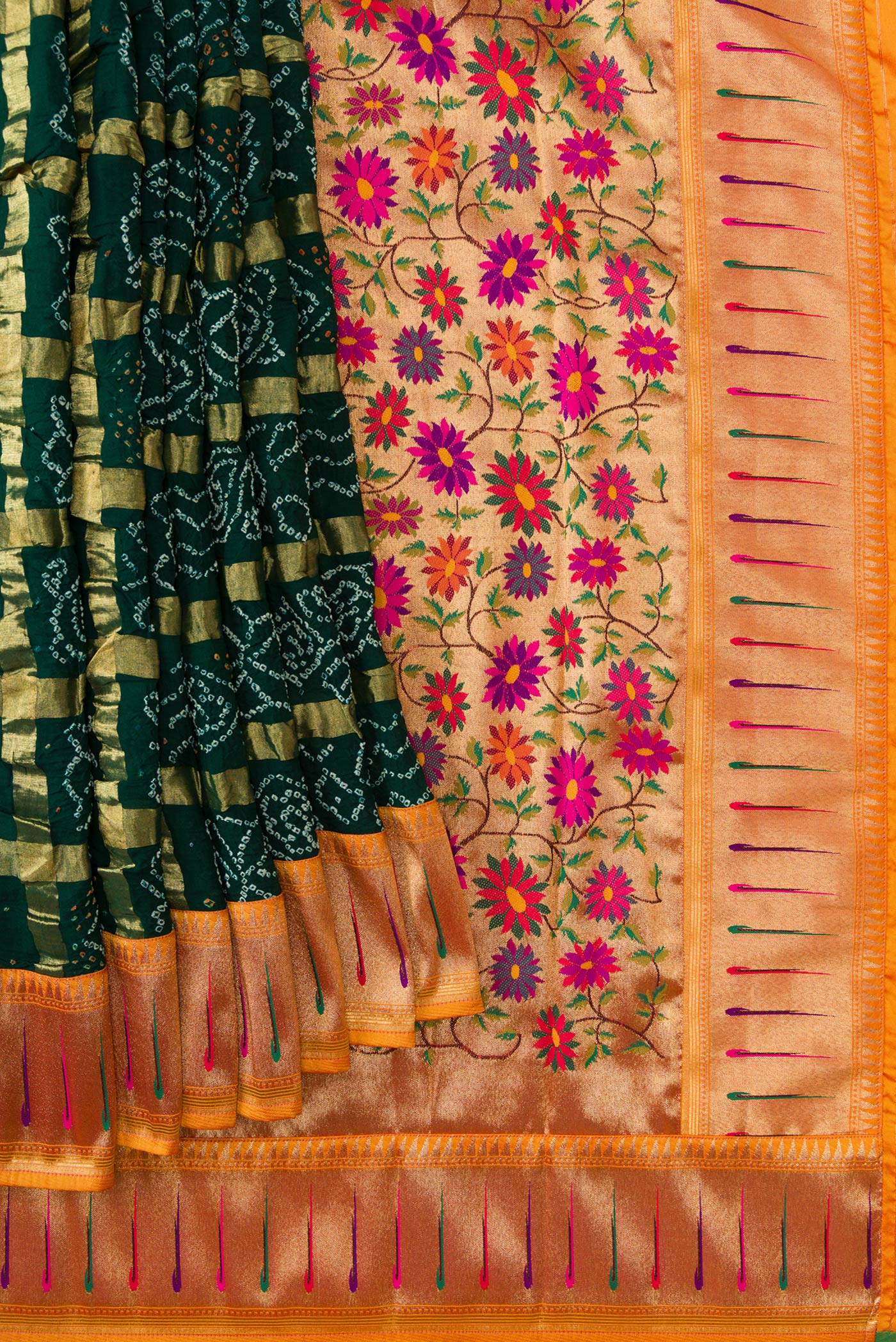 Pleats and pallu of Bottle Green Dual Tone Bandhani Silk Saree with Bandhani Print on the body and Paithani Border. 