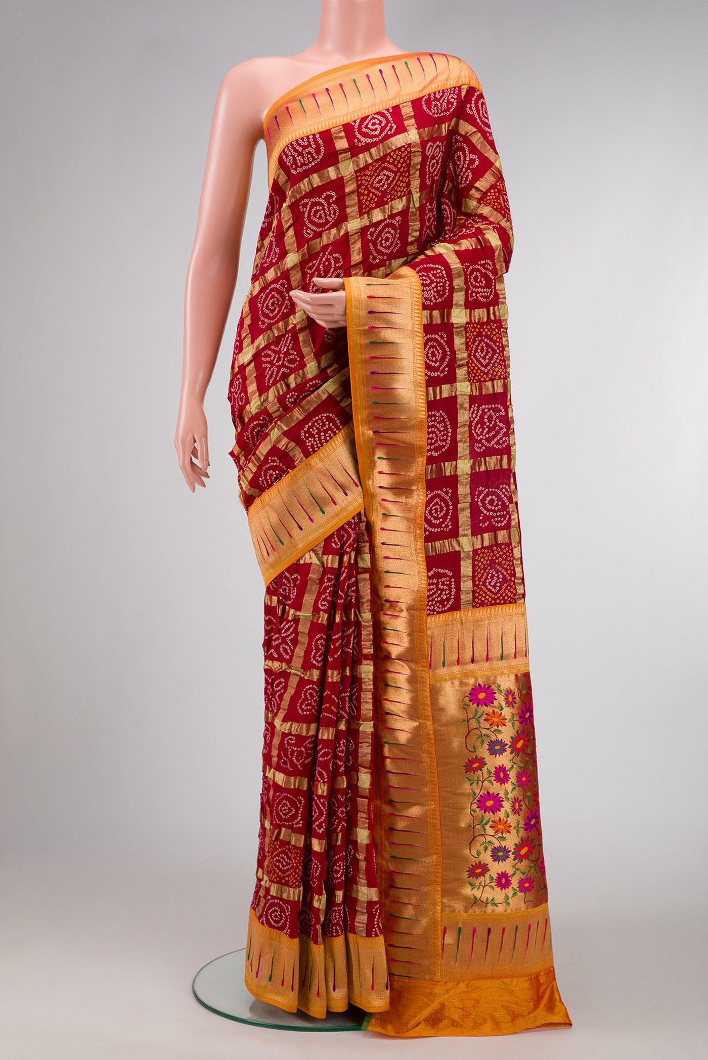 Maroon Dual Tone Bandhani Georgette Saree with Bandhani Print on the body and Paithani Border.  displayed on a mannequin