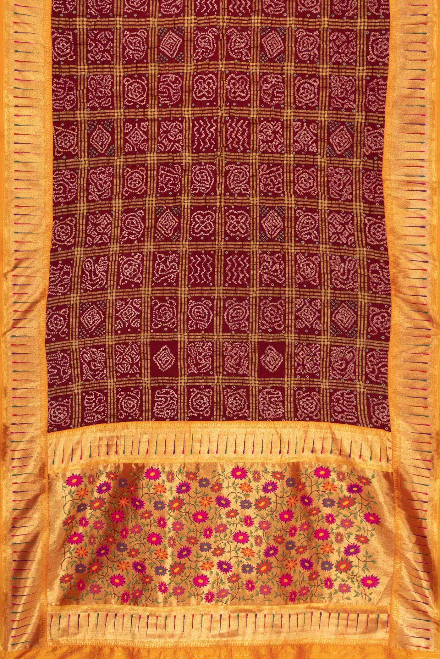Flat view of Maroon Dual Tone Bandhani Silk Saree with Bandhani Print on the body and Paithani Border. 