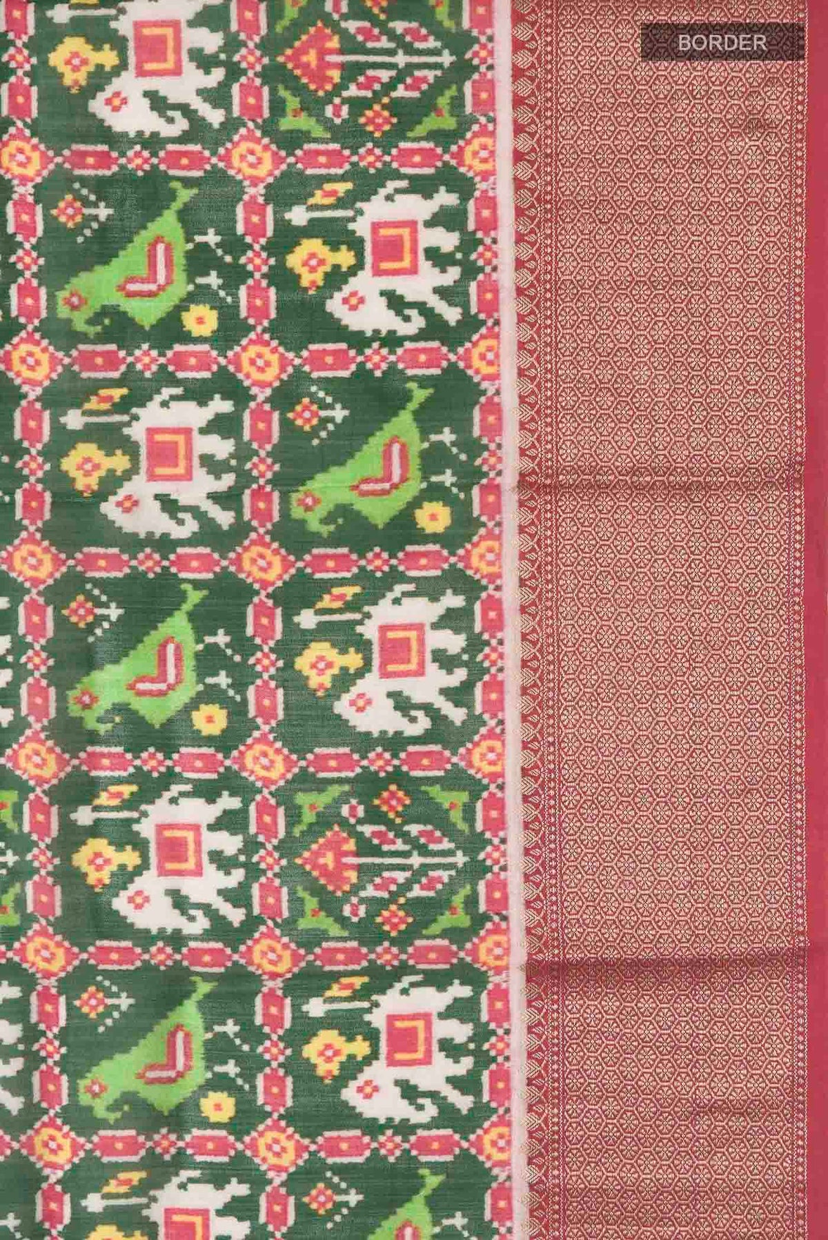 Border image of Green Tussar Silk Saree with Printed design on the body and Zari Border