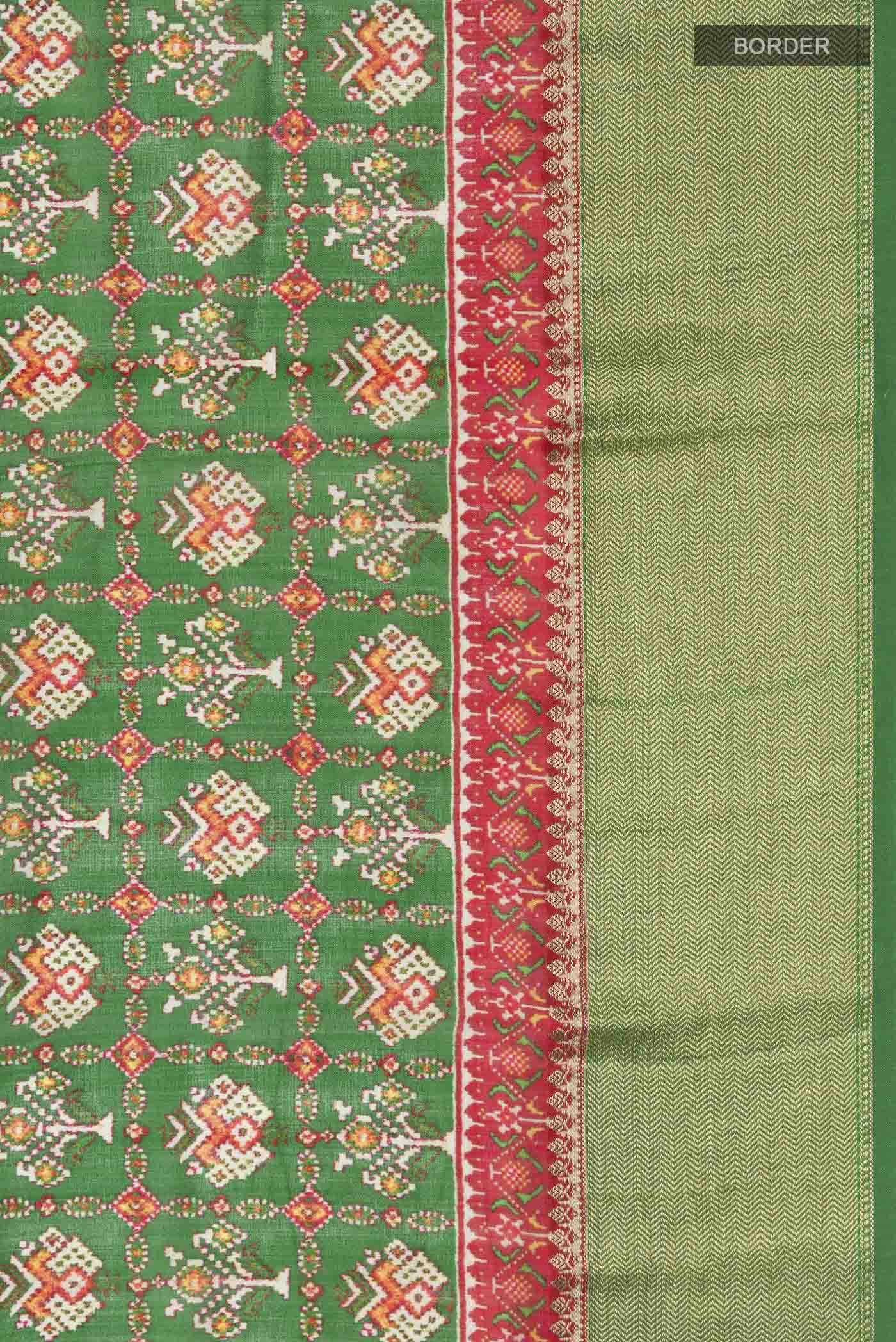 Border image of Green Tussar Silk Saree with Printed design on the body and Zari Border