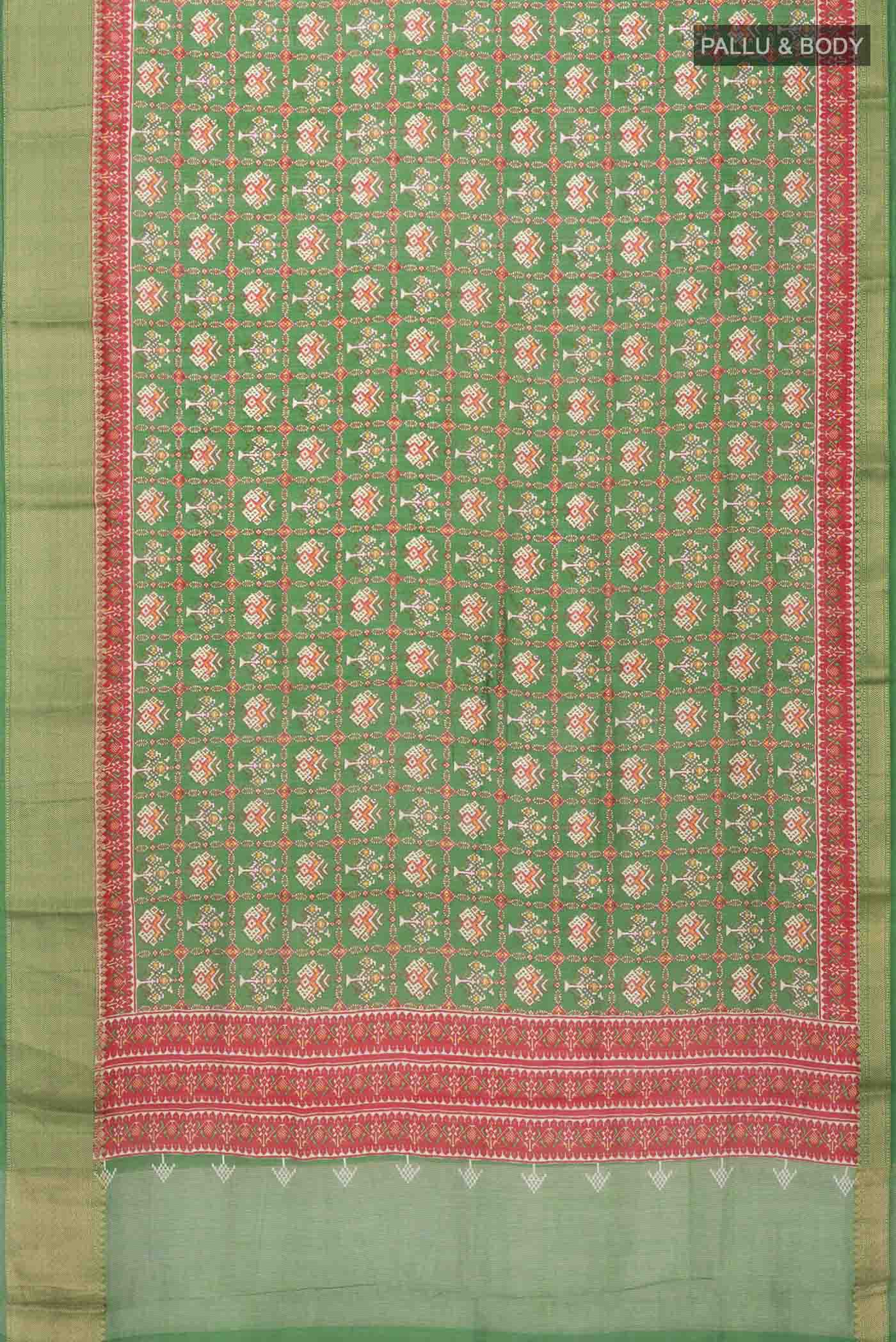 Flat view of Green Tussar Silk Saree with Printed design on the body and Zari Border
