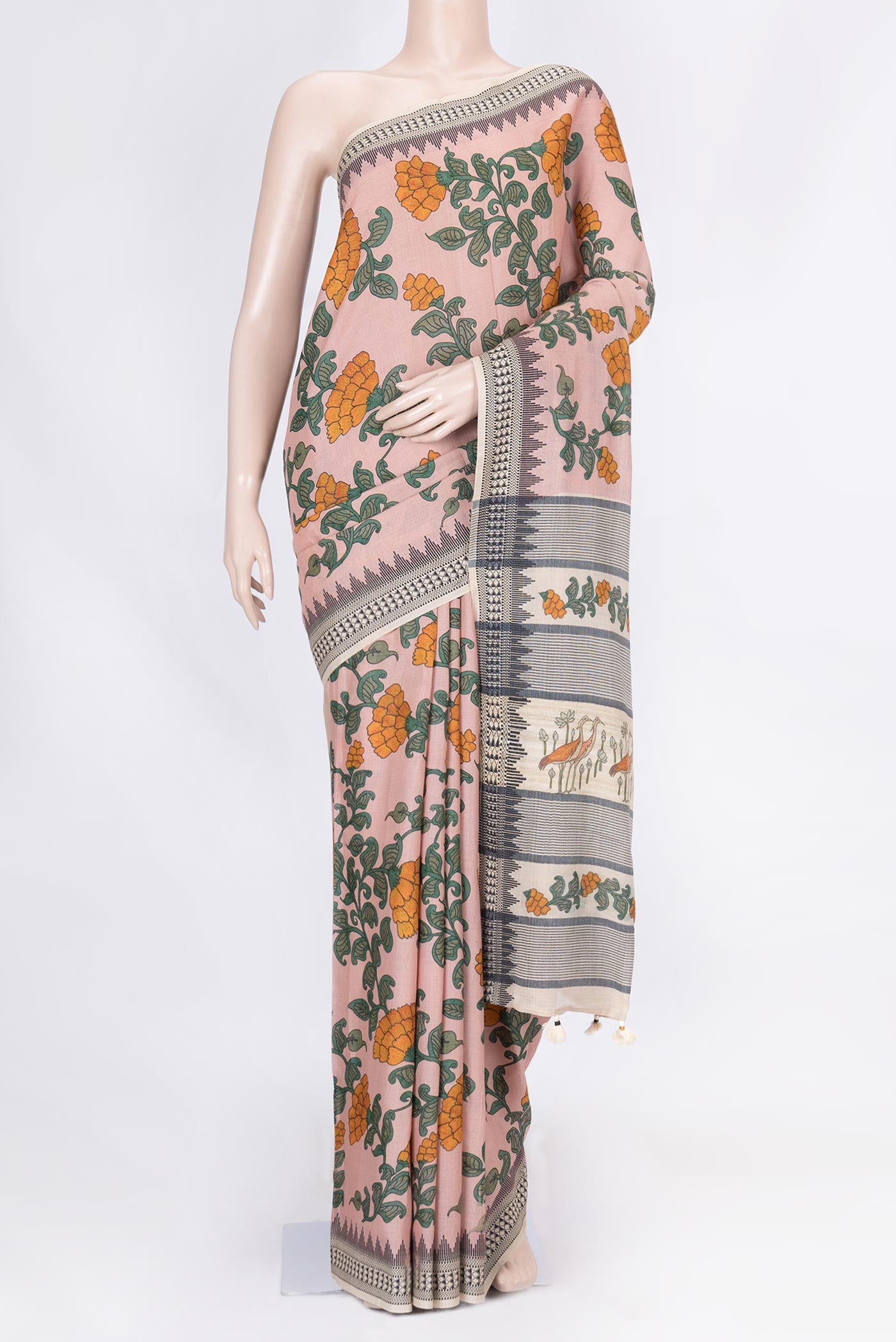 Pink Dual Tone Tussar Saree with kalamkari Print on the body and Thread Border displayed on a mannequin