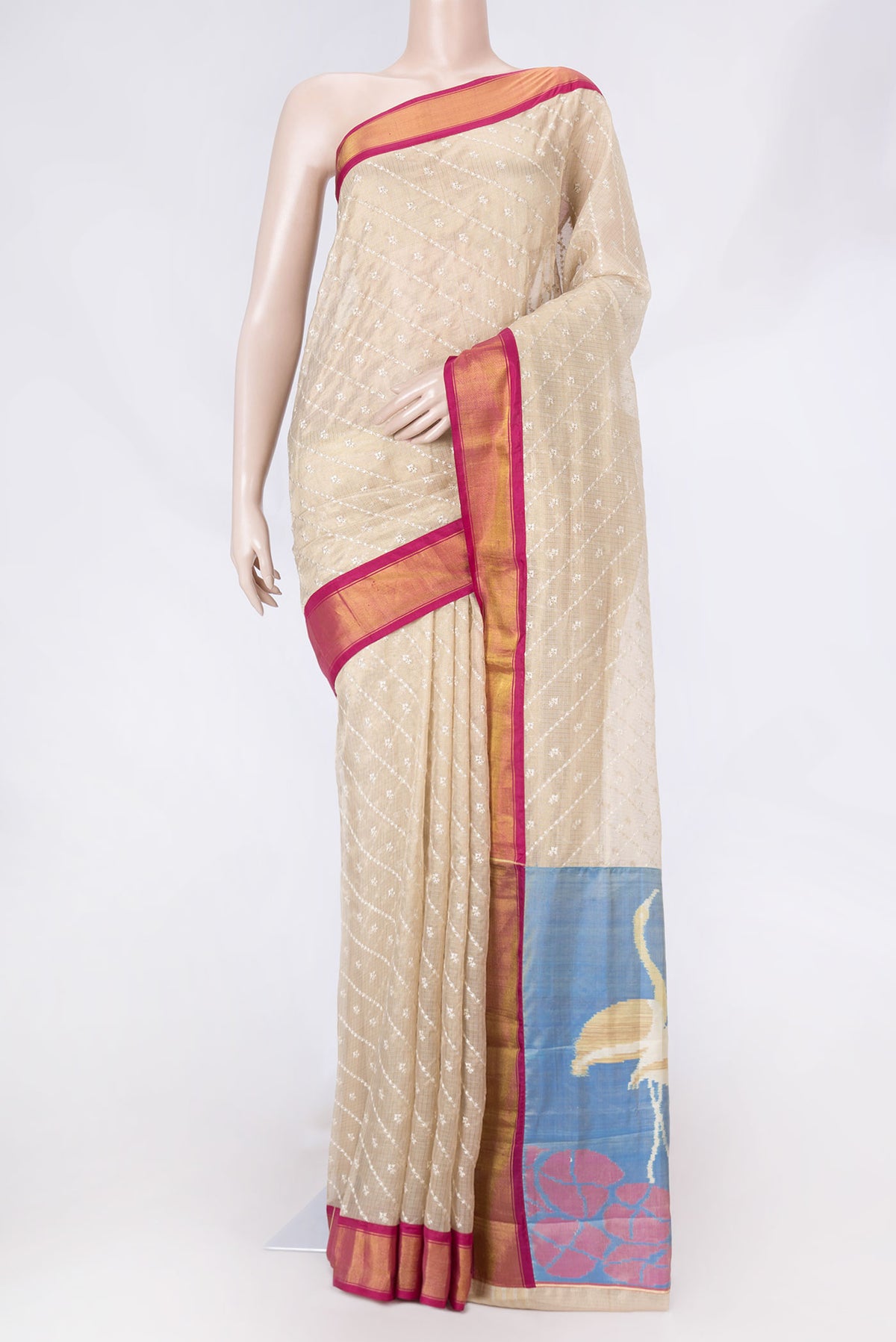 Beige Dual Tone Kota Silk Saree with Embroidery on the body and Zari Border displayed on a mannequin