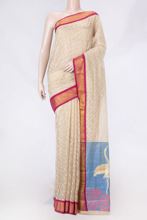 Beige Dual Tone Kota Silk Saree with Embroidery on the body and Zari Border displayed on a mannequin