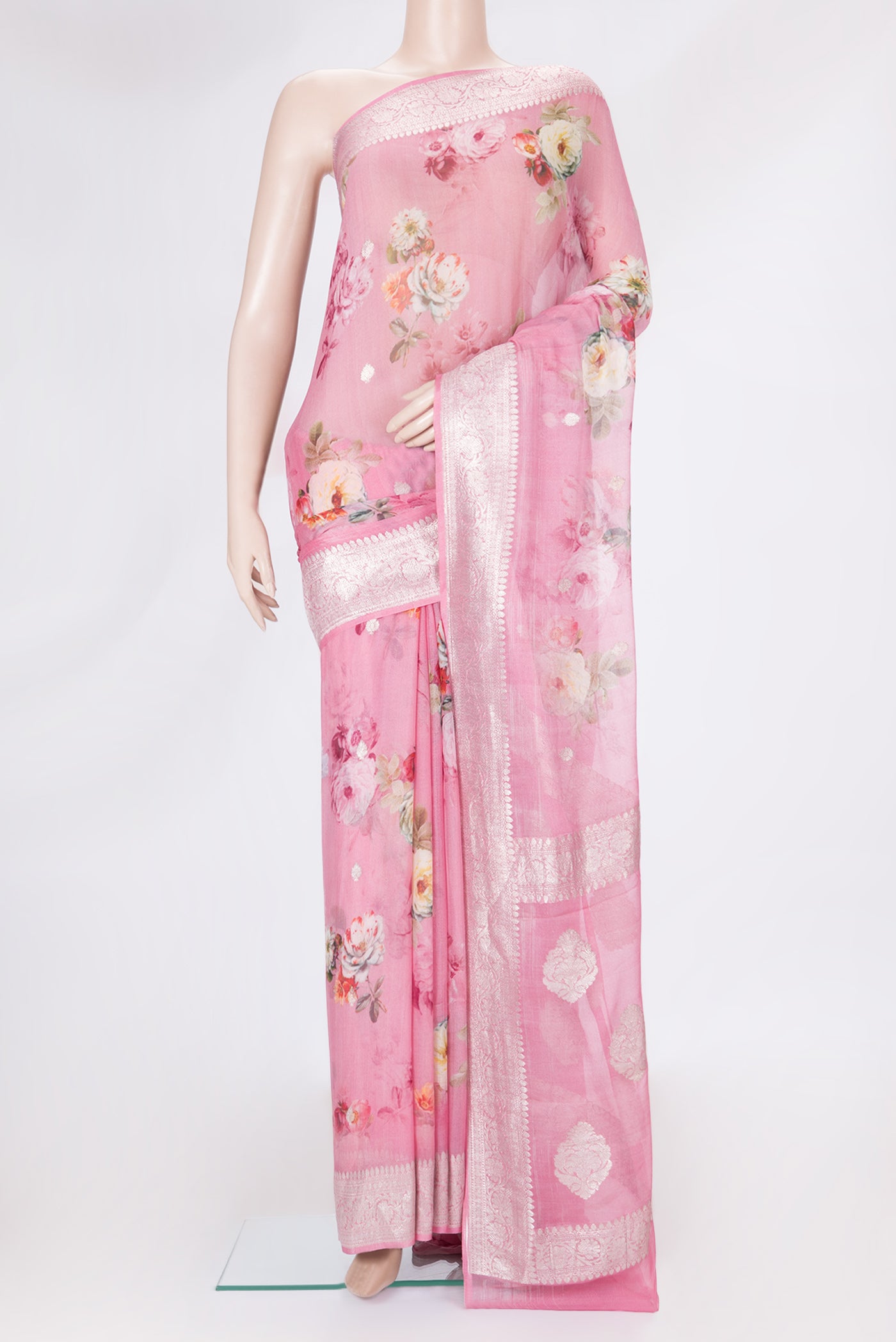 Pink Dual Tone Mysore Georgette Saree with Printed design on the body and Zari Border.  displayed on a mannequin