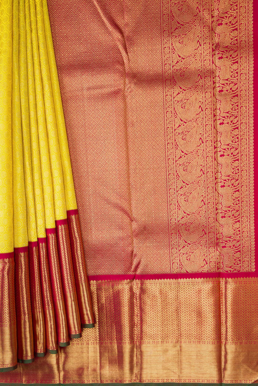 Pleats and pallu of Pure Silk Pure Zari Parrot Green Dual Tone Kanjivaram Saree with Zari Brocade on the body and Zari Border. 