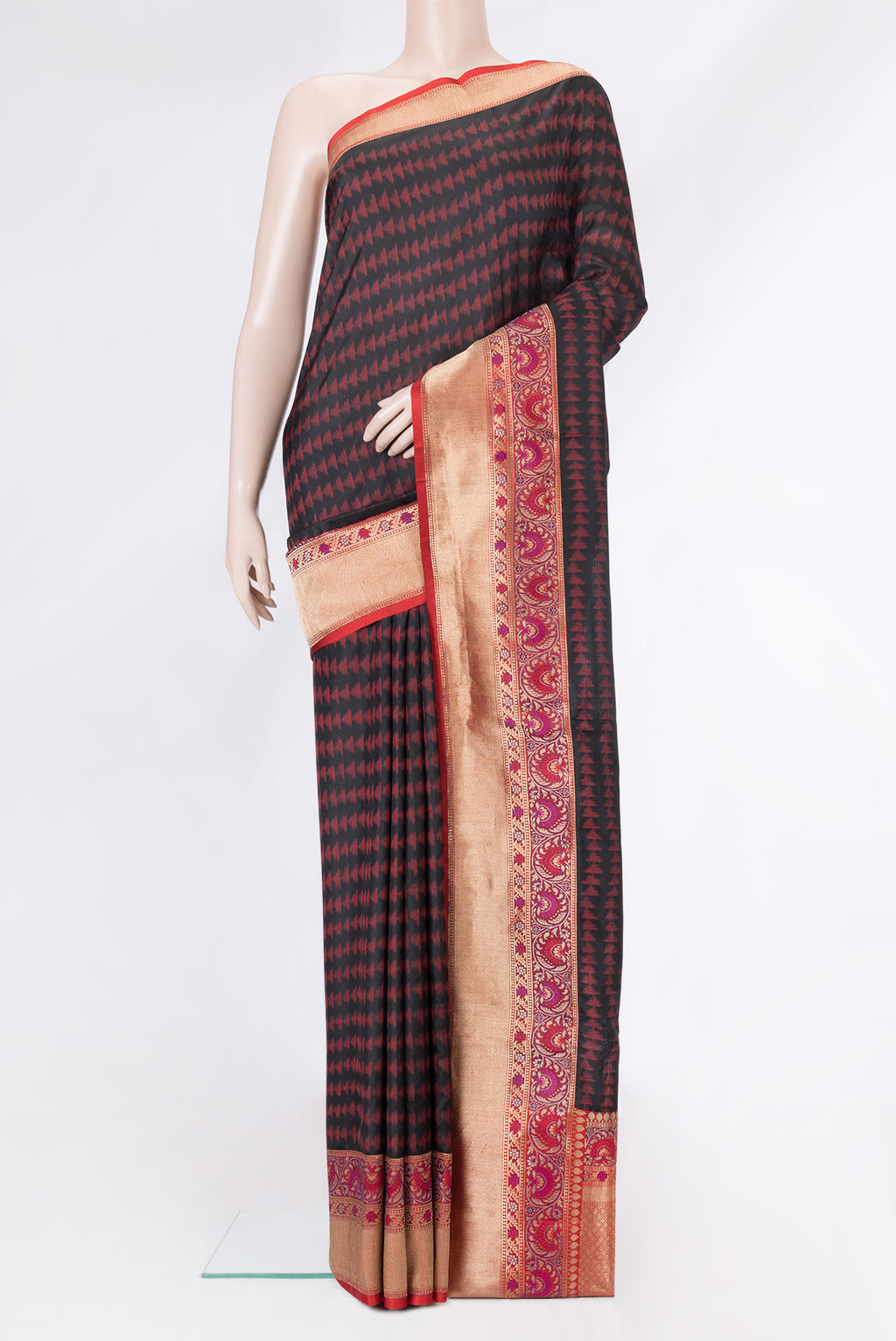 Black Dual Tone Double Ikat Saree with Ikat Print on the body and Fancy Border.  displayed on a mannequin