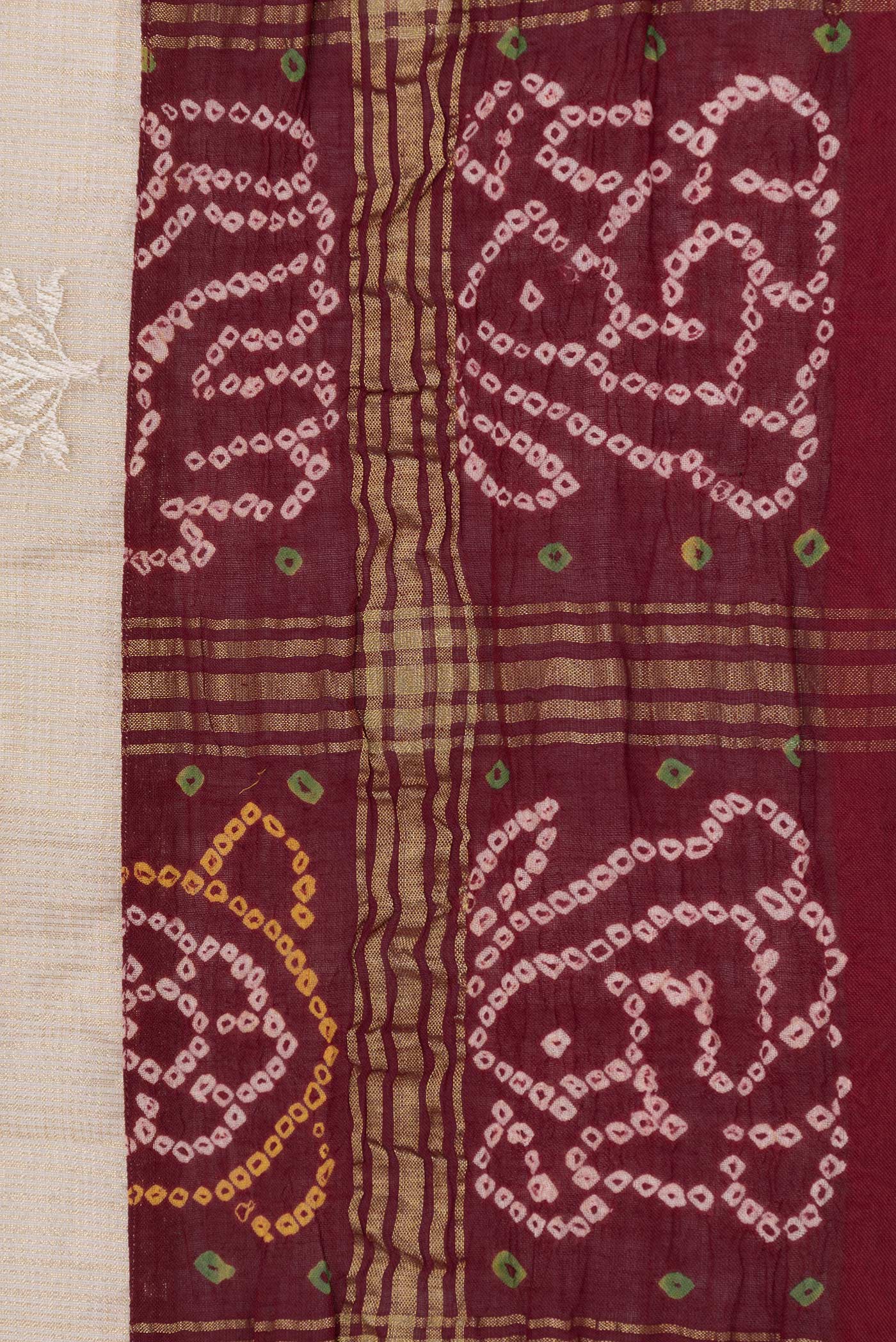 Border image of Beige Dual Tone Organza Silk Saree with Embroidery on the body and Checks Border. 