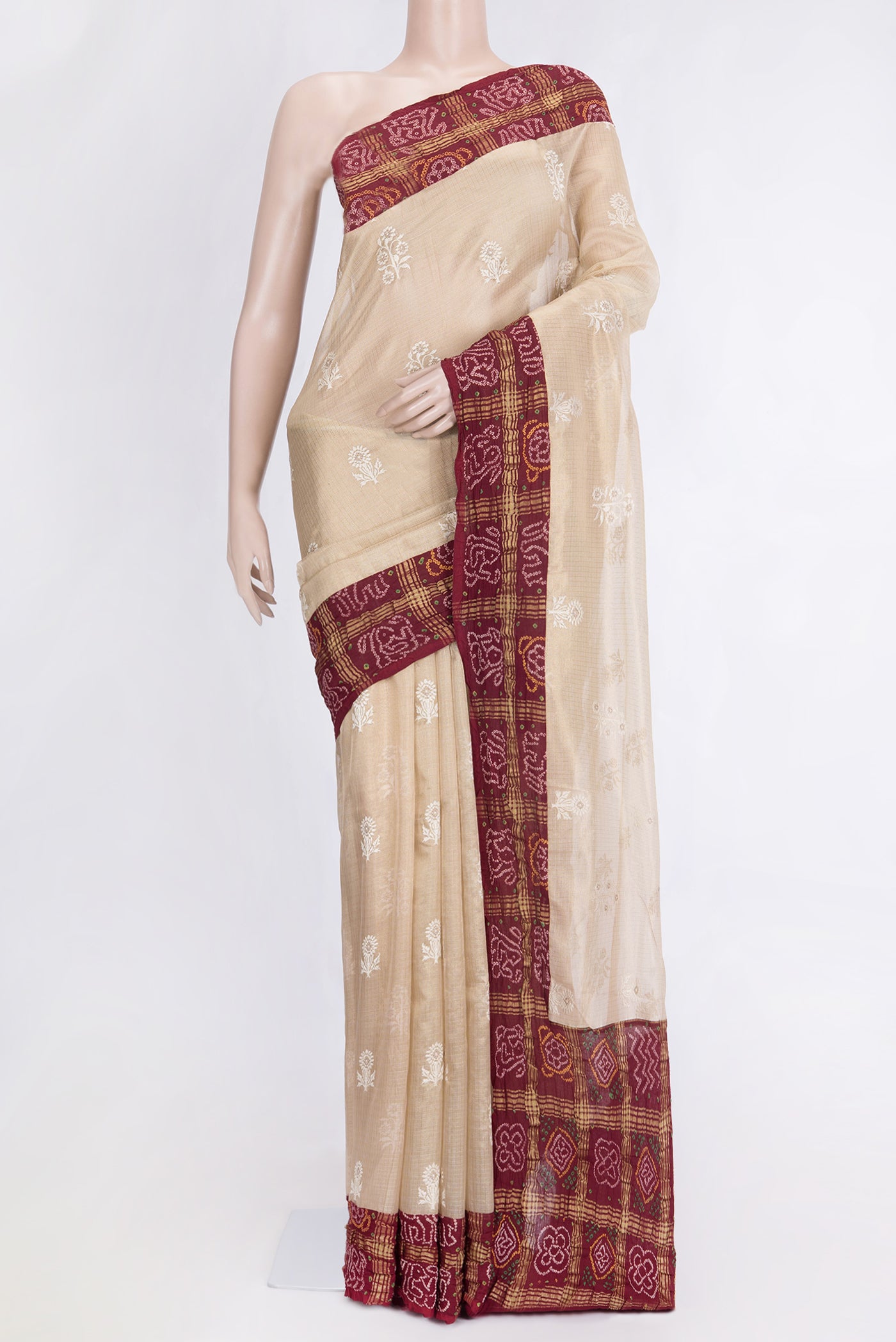 Beige Dual Tone Organza Silk Saree with Embroidery on the body and Checks Border.  displayed on a mannequin