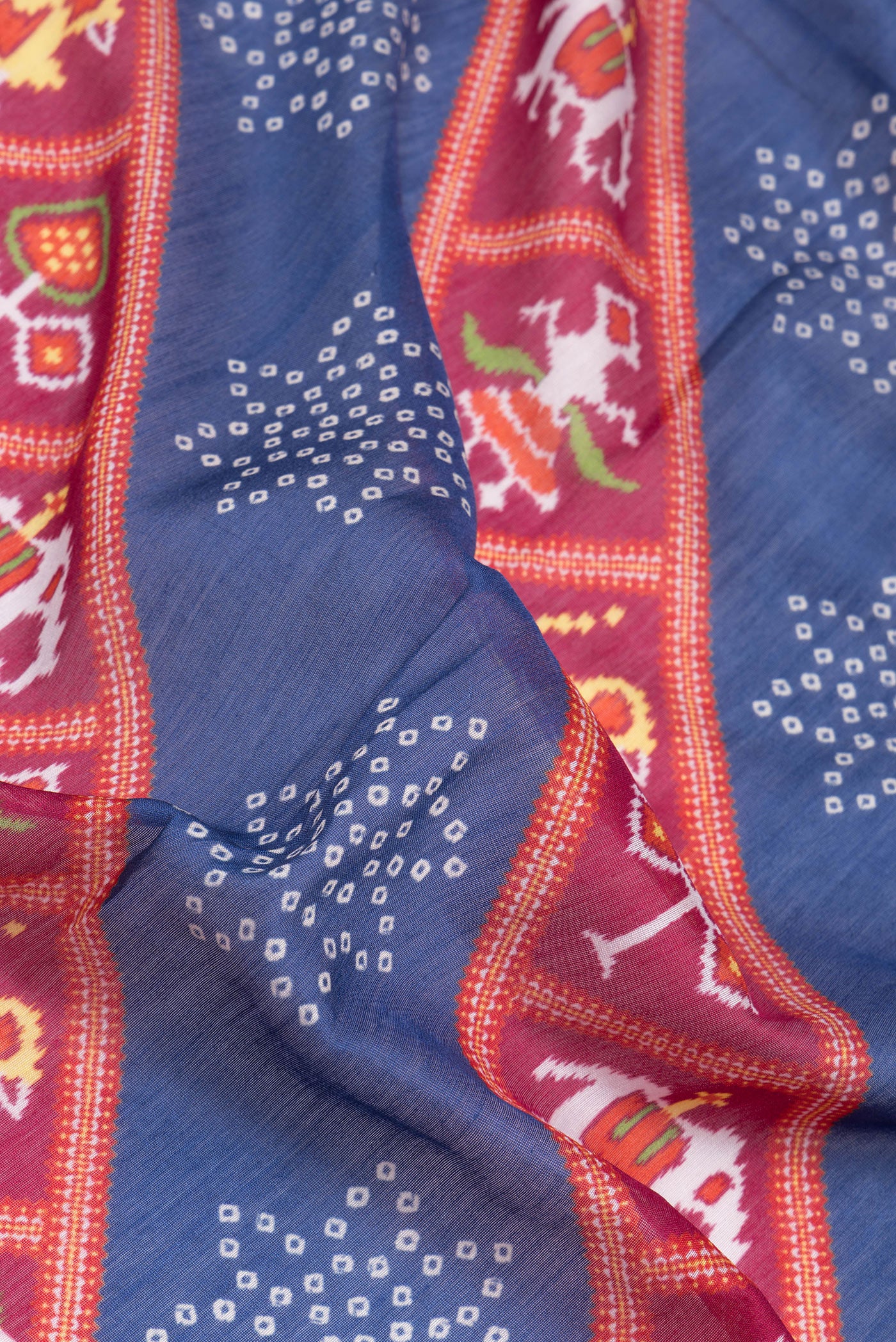 Close up of Multi Color Chanderi Silk Saree with Printed design on the body and Zari Border.  displaying folds