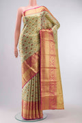 Gold with Green Color Kanchipuram Tissue Silk Saree with Zari Brocade on the body and Zari Border displayed on a mannequin
