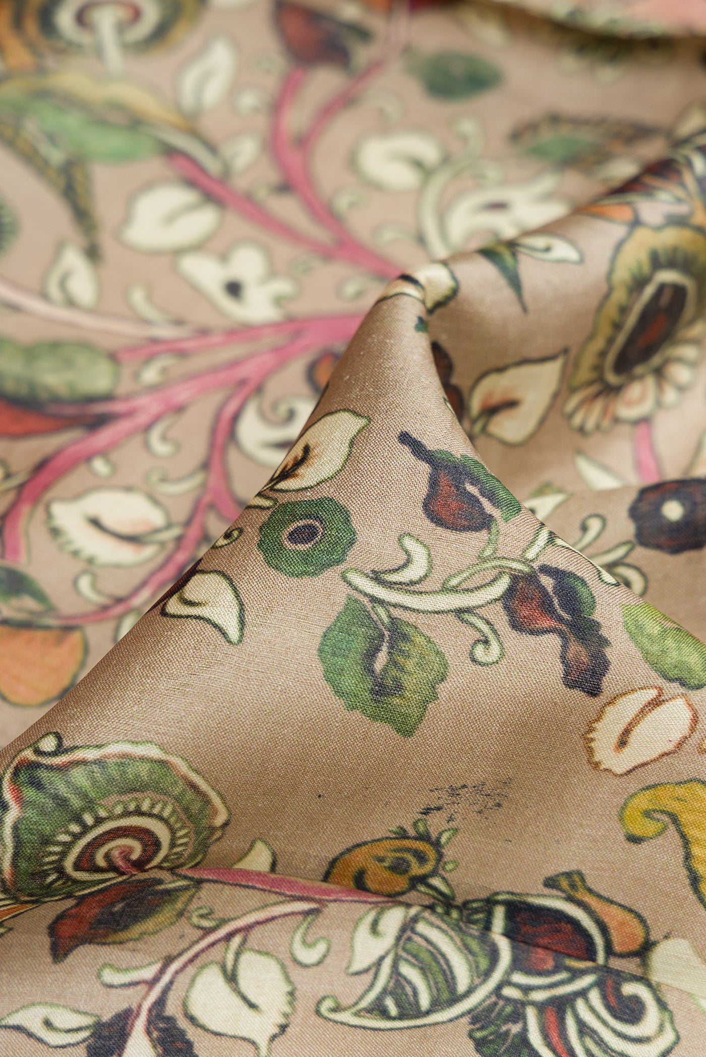 Close up of Dark Beige Dual Tone Printed Silk Saree with Printed design on the body and Thread Border.  displaying folds
