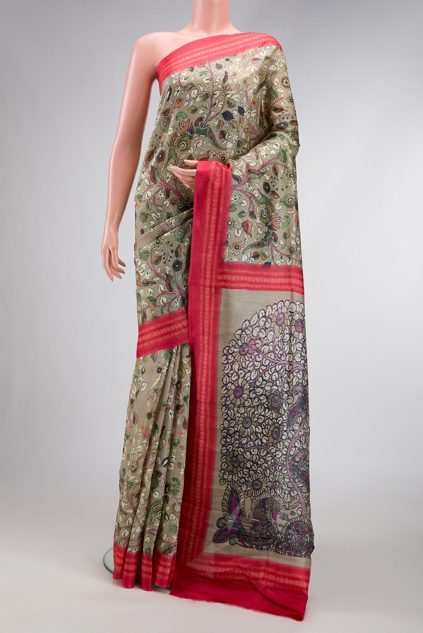 Dark Beige Dual Tone Printed Silk Saree with Printed design on the body and Thread Border.  displayed on a mannequin
