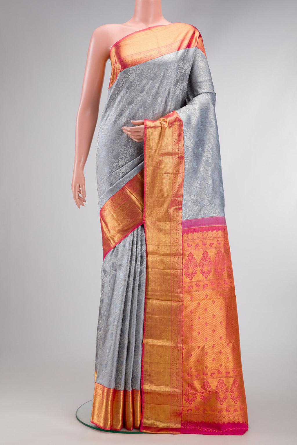 Grey Dual Tone Kanchipuram Silk Saree with Jacquard With Zari Butta on the body and Zari Border.  displayed on a mannequin