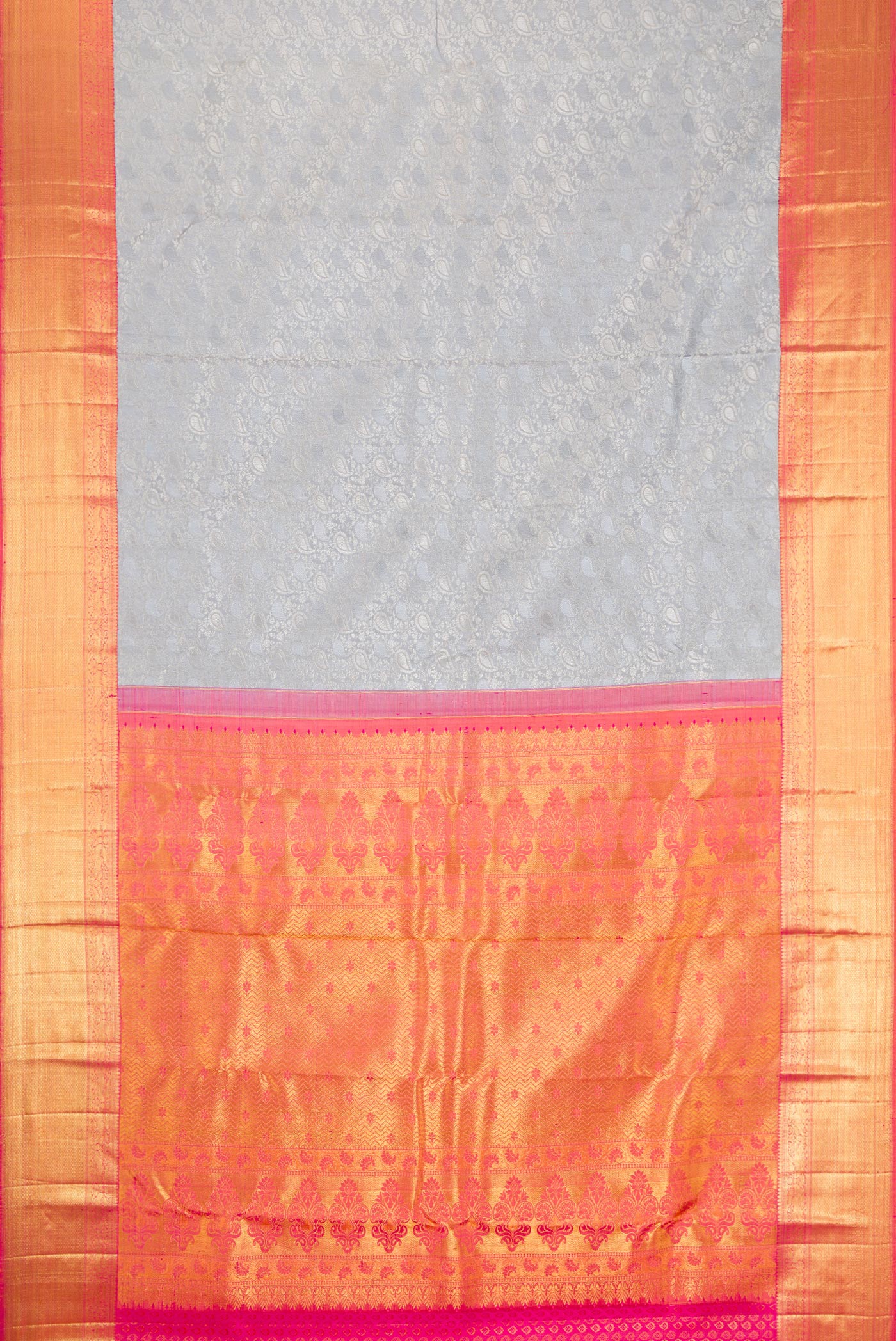 Flat view of Grey Dual Tone Kanchipuram Silk Saree with Jacquard With Zari Butta on the body and Zari Border. 