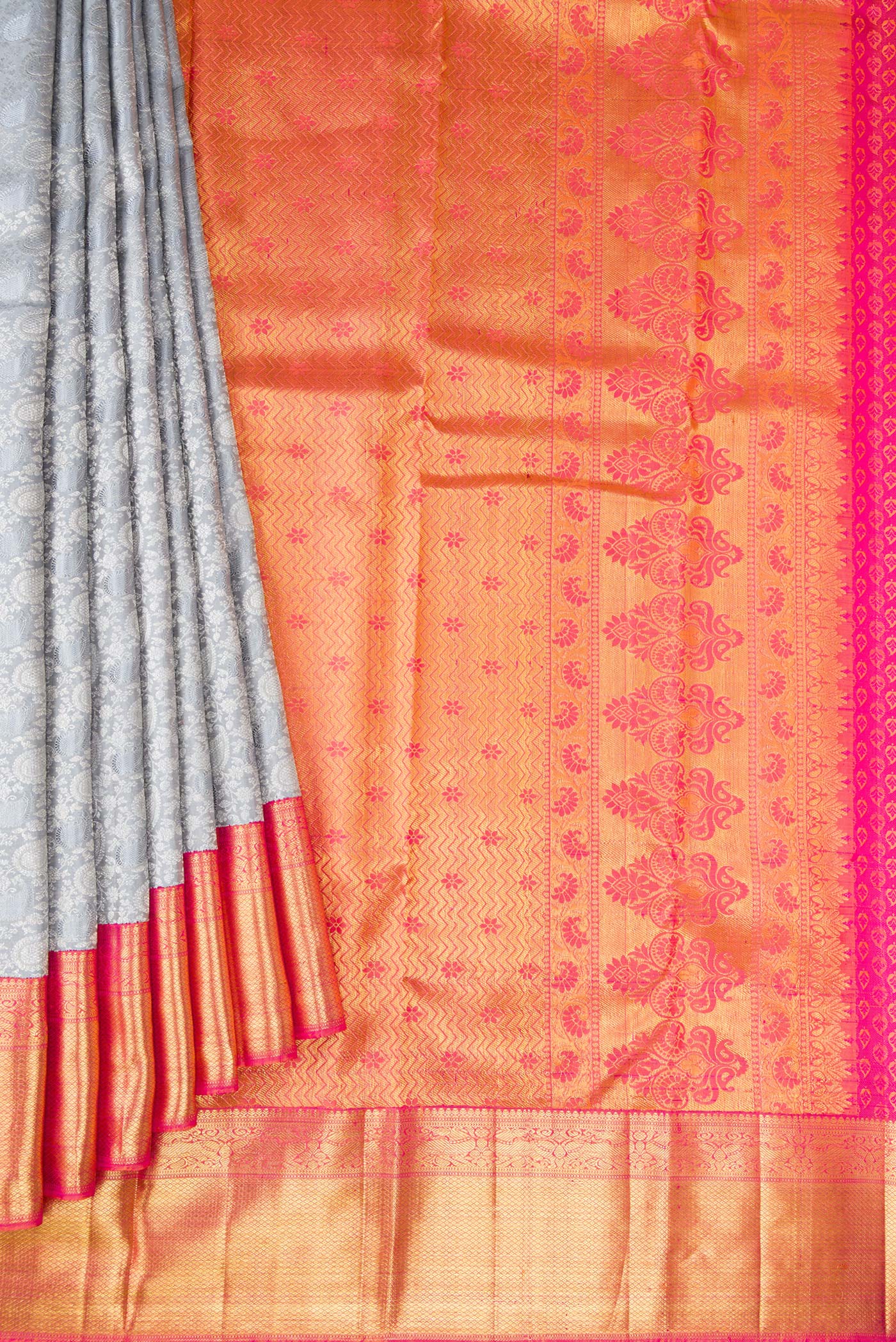 Pleats and pallu of Grey Dual Tone Kanchipuram Silk Saree with Jacquard With Zari Butta on the body and Zari Border. 