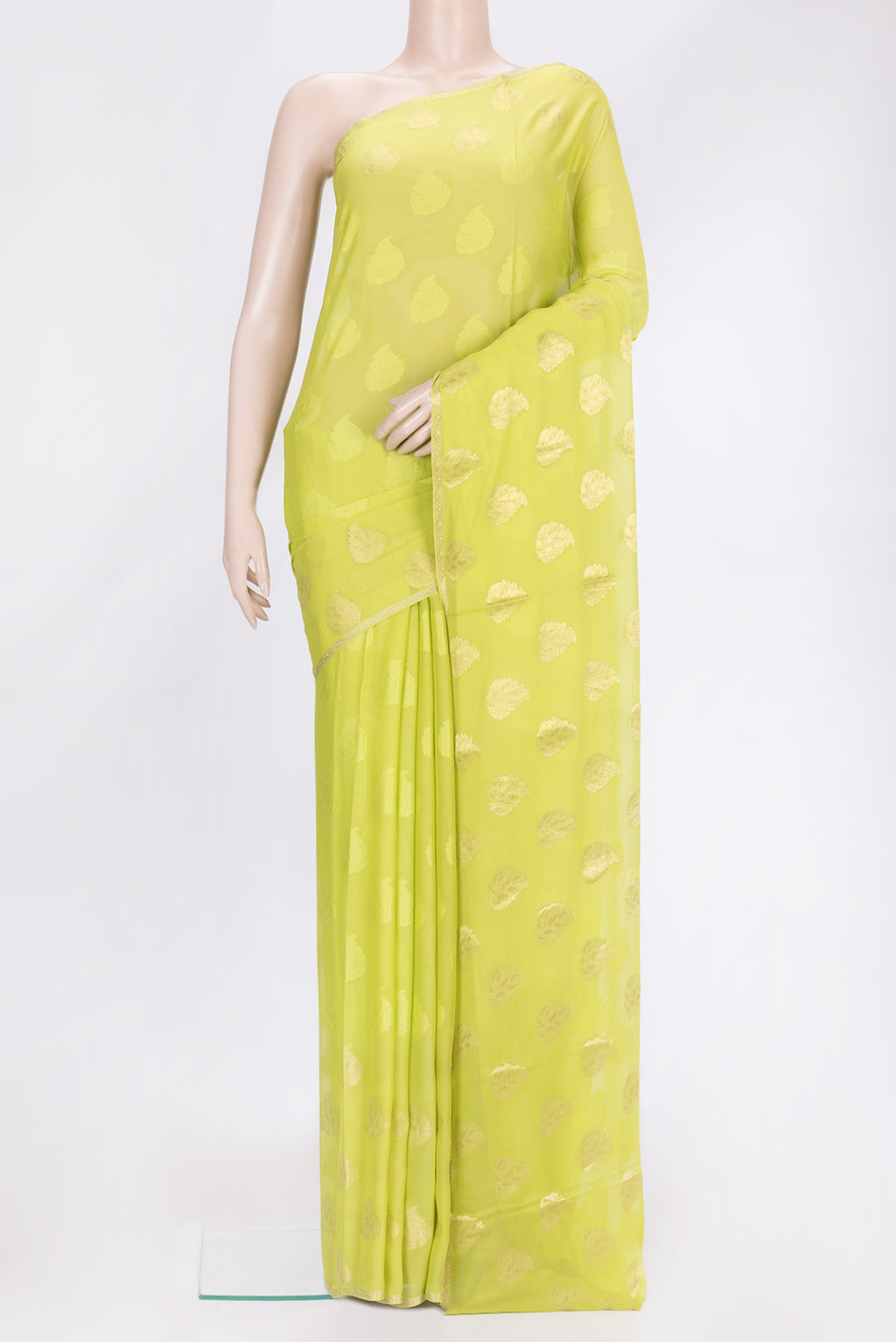 Parrot Green Dual Tone Mysore Georgette Saree with Zari Butta on the body and Zari Border.  displayed on a mannequin