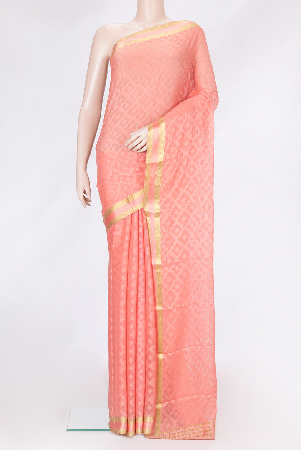 Golden Peach Dual Tone Georgette Saree with Jacquard design on the body and Zari Border.  displayed on a mannequin