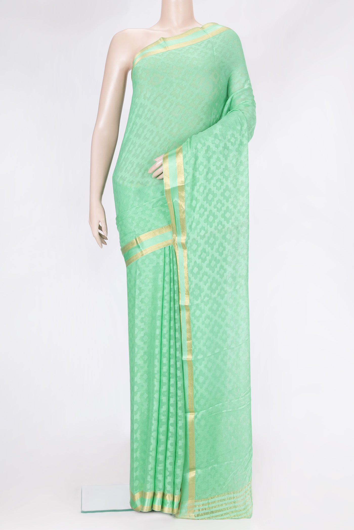 Sea Green Dual Tone Georgette Saree with Jacquard design on the body and Zari Border.  displayed on a mannequin