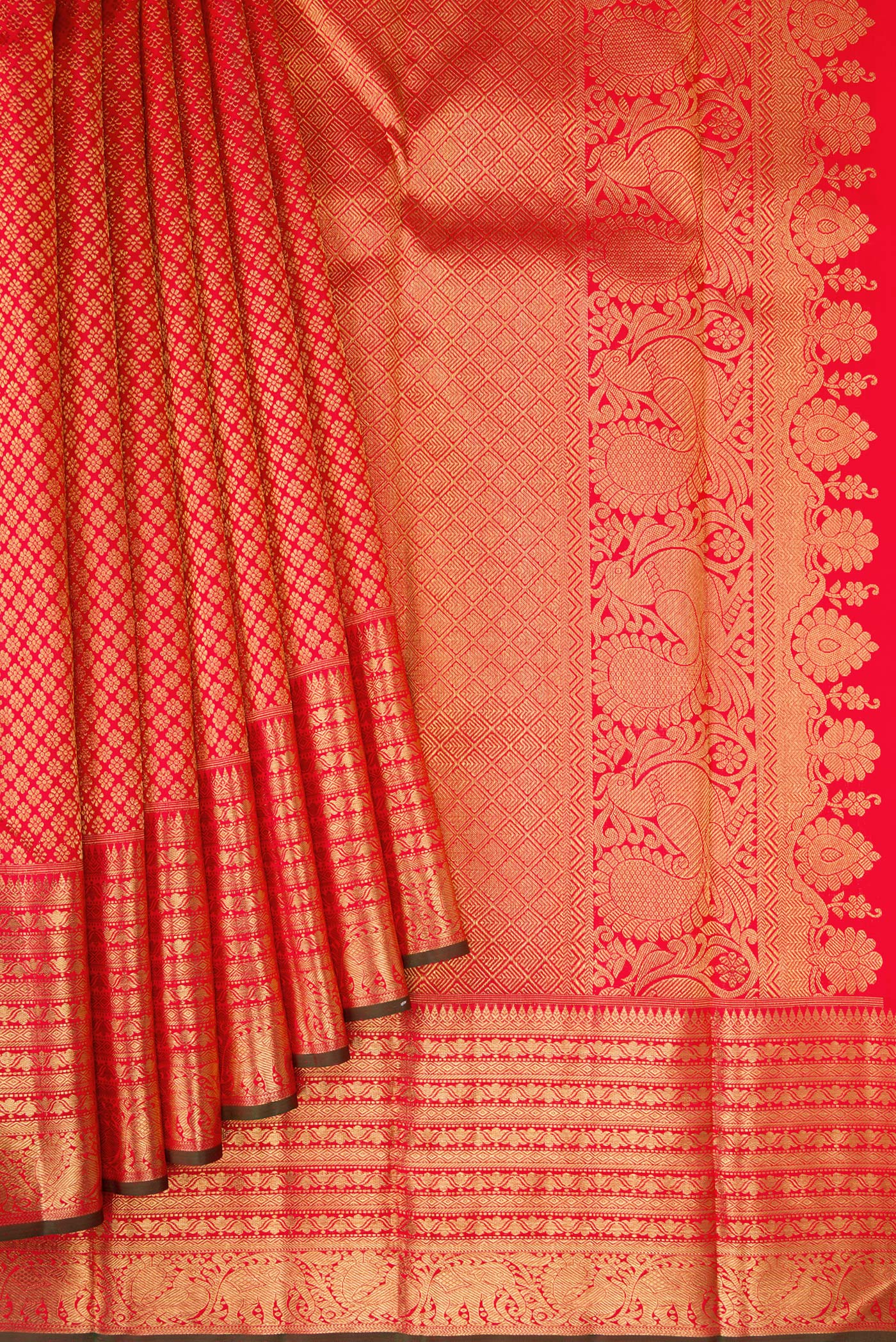 Pleats and pallu of Pure Silk Pure Zari Red Kanjivaram Saree with Zari Brocade on the body and Zari Border. 