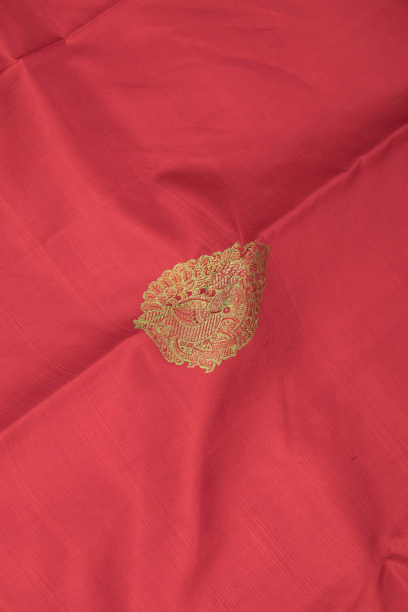 Close up of Black Dual Tone Kanchipuram Silk Saree with Jacquard design on the body and Without Border displaying folds