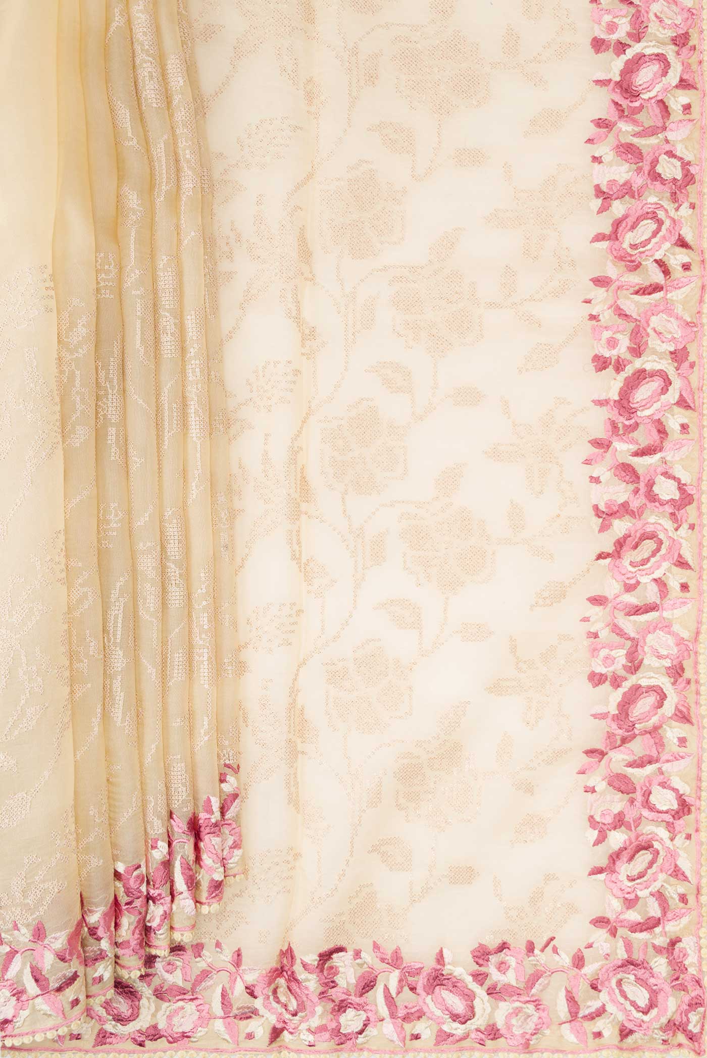 Pleats and pallu of Beige Dual Tone Organza Silk Saree with Embroidery on the body and Embroidery Border. 