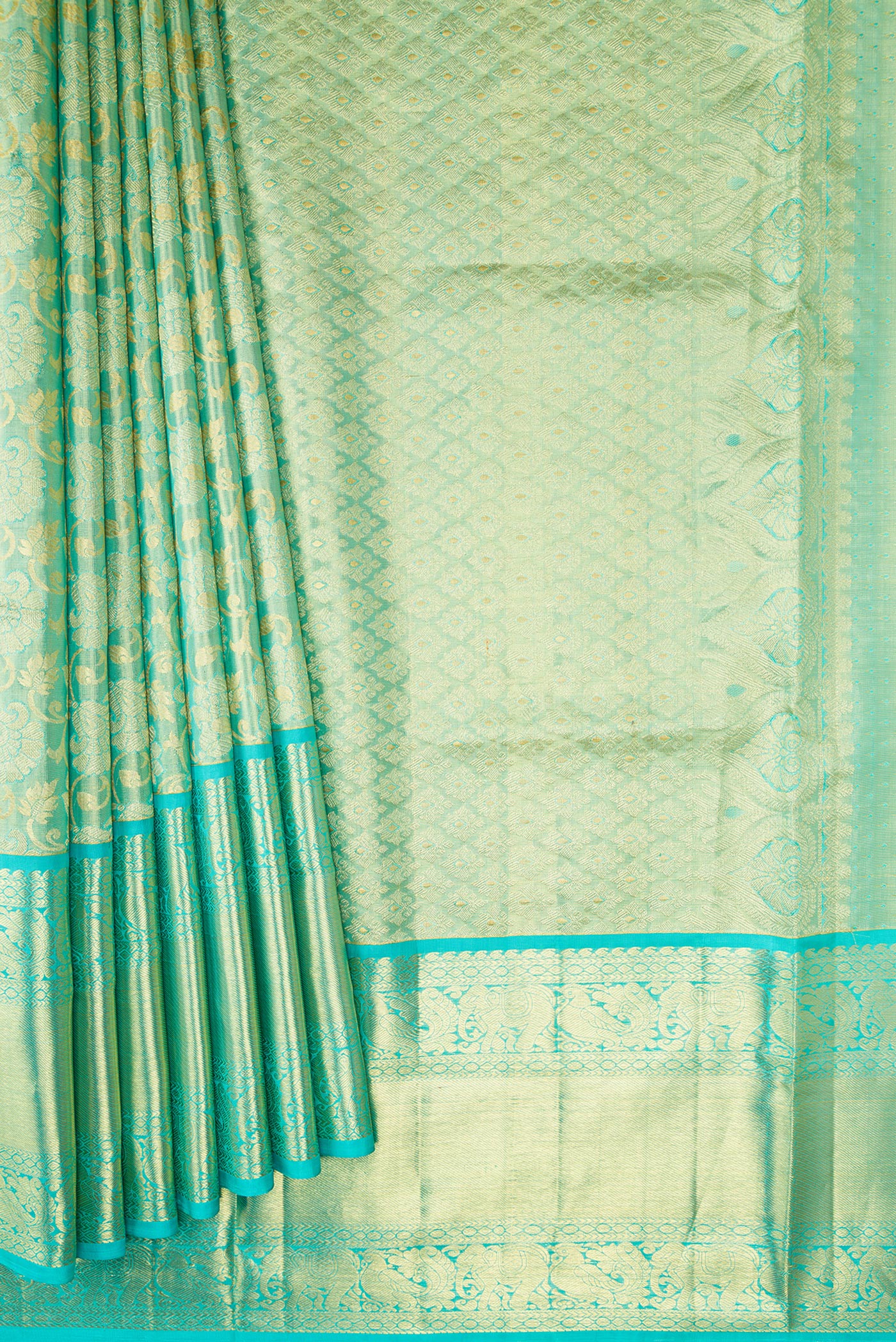 Pleats and pallu of Sky Blue Dual Tone Kanchipuram Tissue Silk Saree with Zari Brocade on the body and Zari Border. 