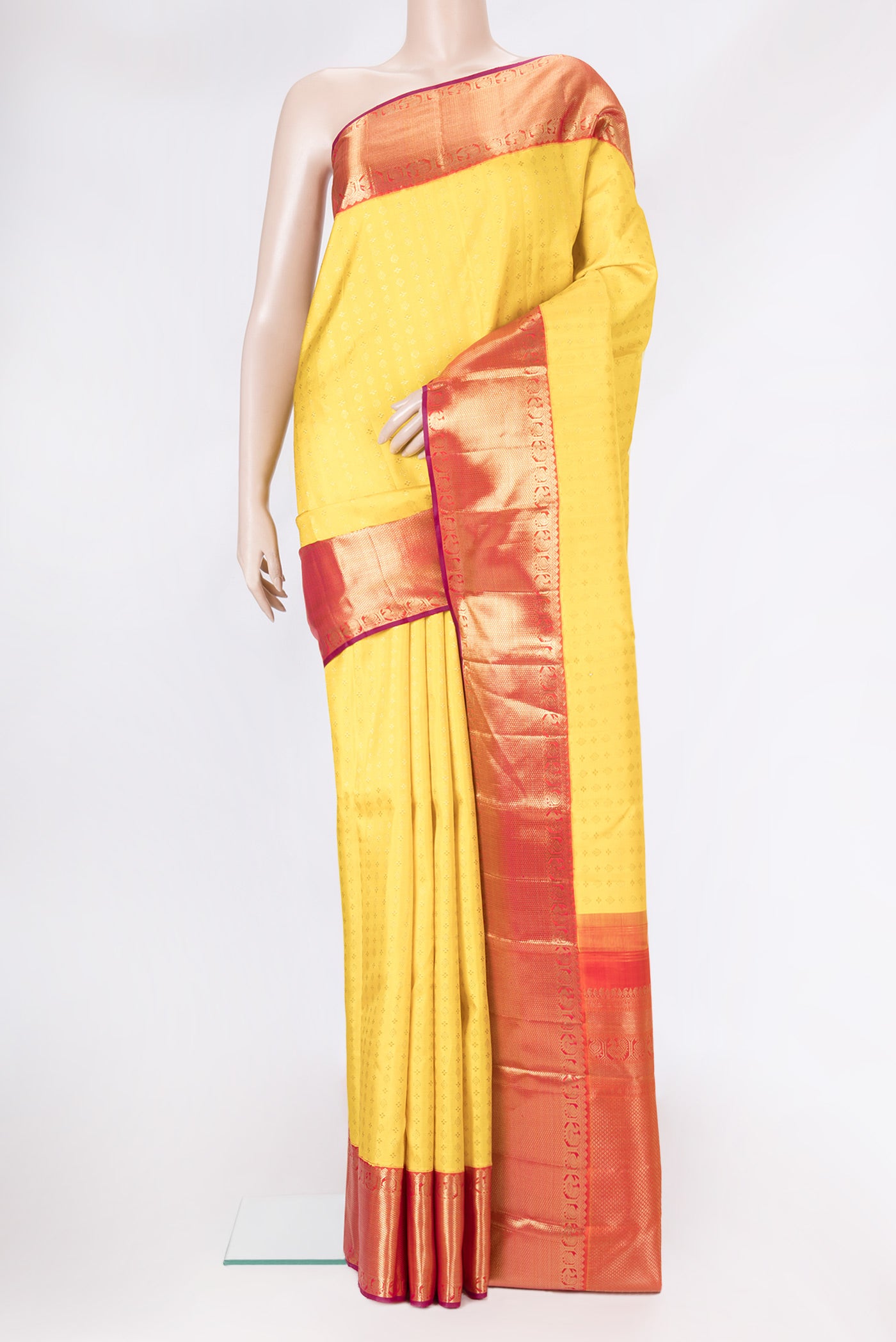 Yellow Dual Tone Kanjivaram Silk Saree with Zari Brocade on the body and Zari Border.  displayed on a mannequin