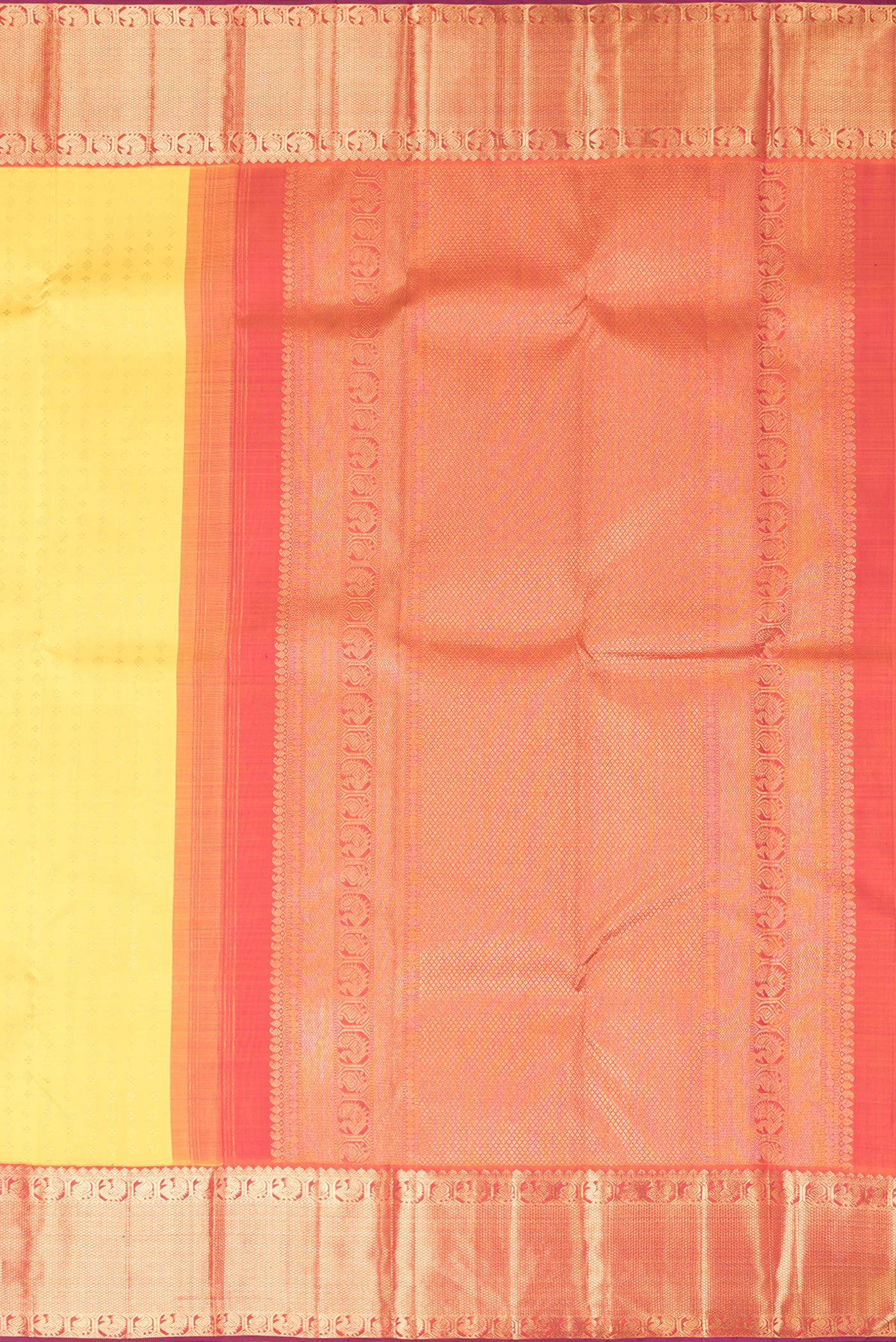 Close up image of the pallu of Yellow Dual Tone Kanjivaram Silk Saree with Zari Brocade on the body and Zari Border. 