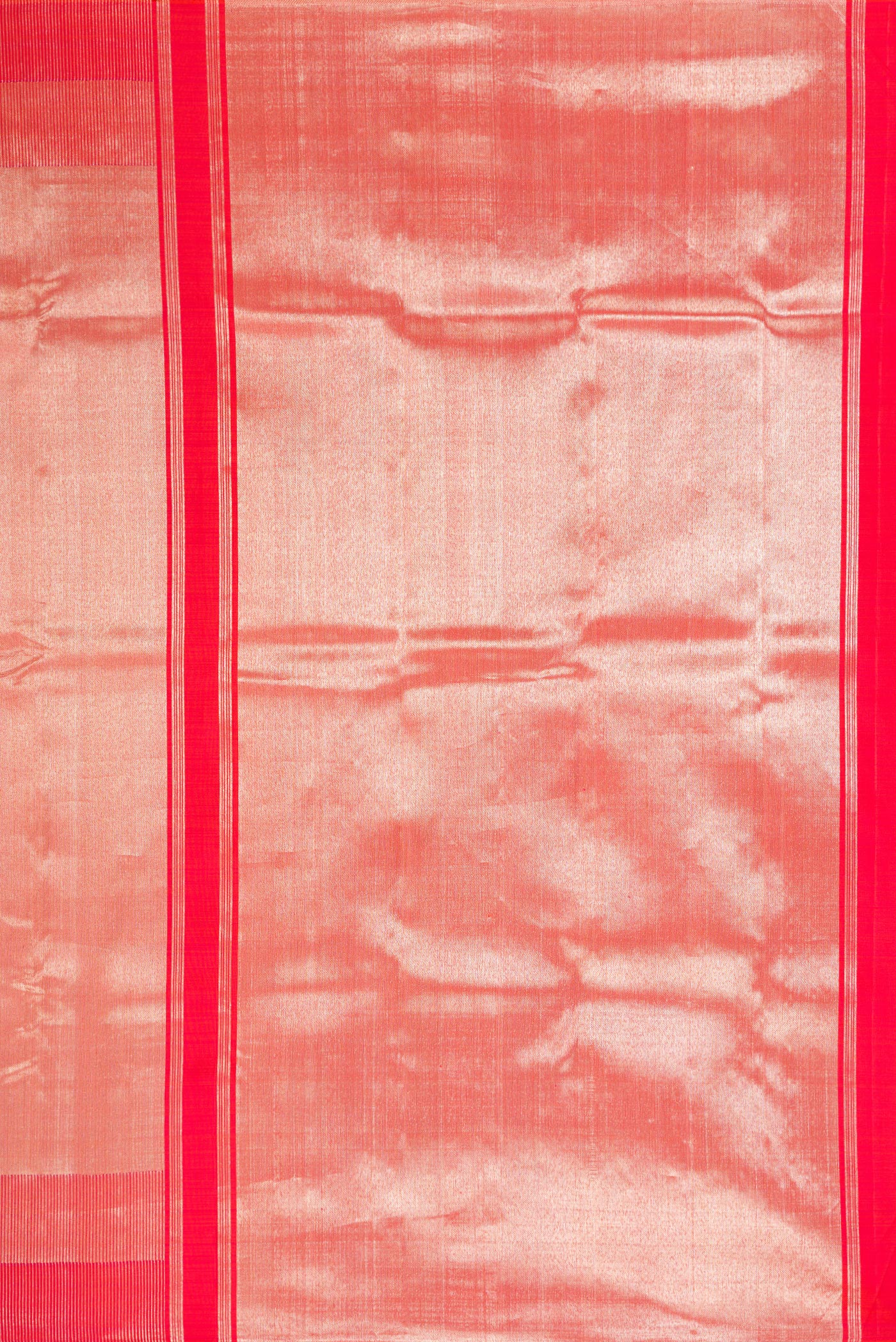 Close up image of the pallu of Coral Dual Tone Kanchipuram Silk Saree with Zari Brocade on the body and Fancy Border. 