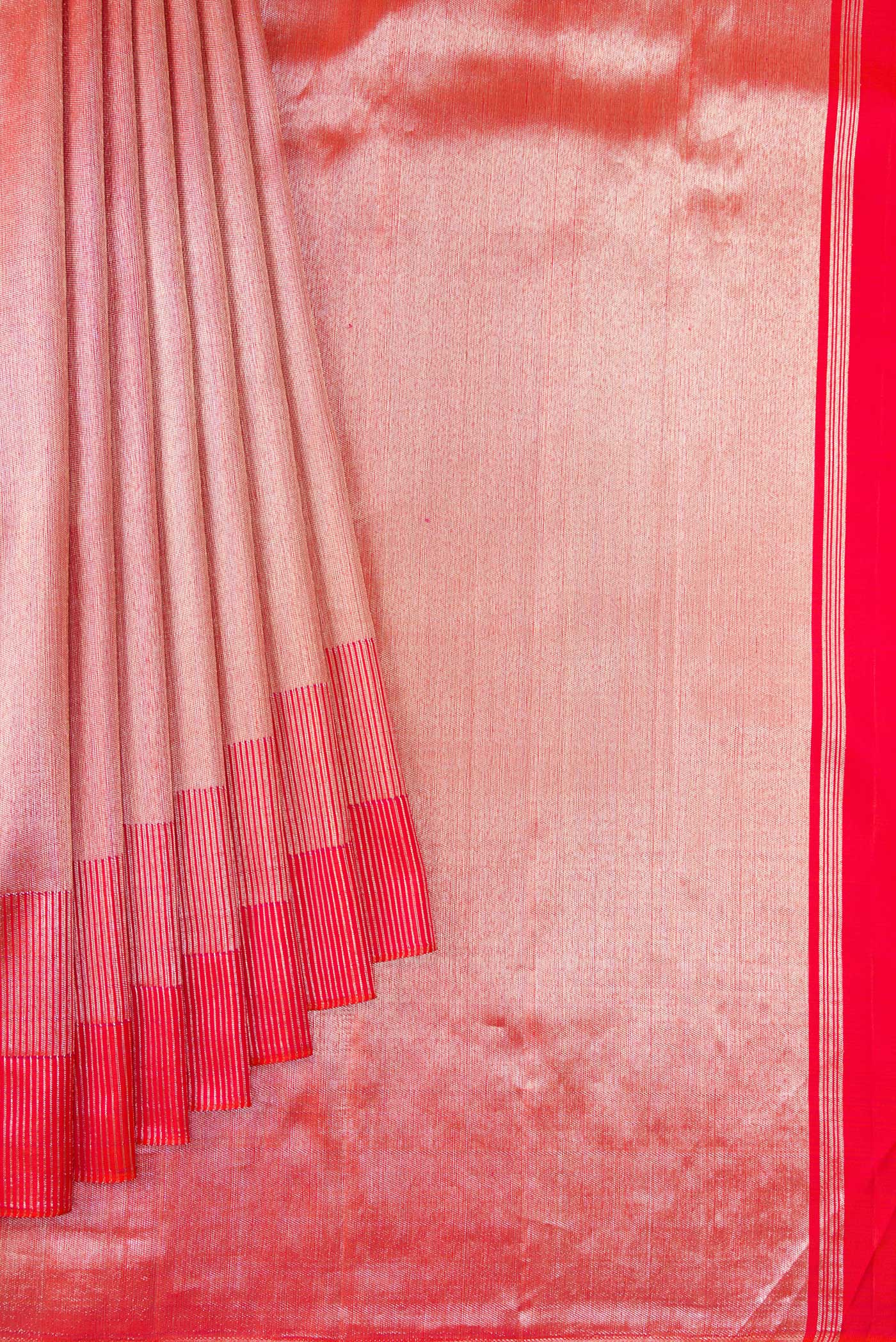 Pleats and pallu of Coral Dual Tone Kanchipuram Silk Saree with Zari Brocade on the body and Fancy Border. 