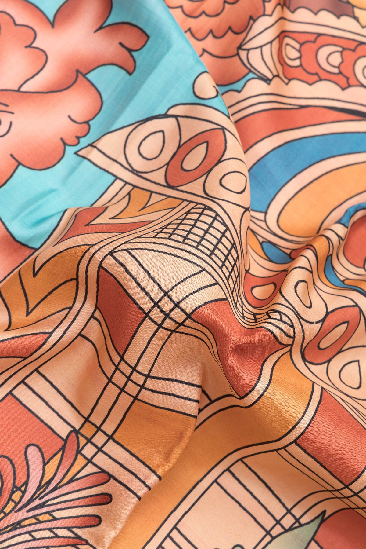 Close up of Golden Peach Dual Tone Kanchipuram Silk Saree with Printed design on the body and Zari Border.  displaying folds