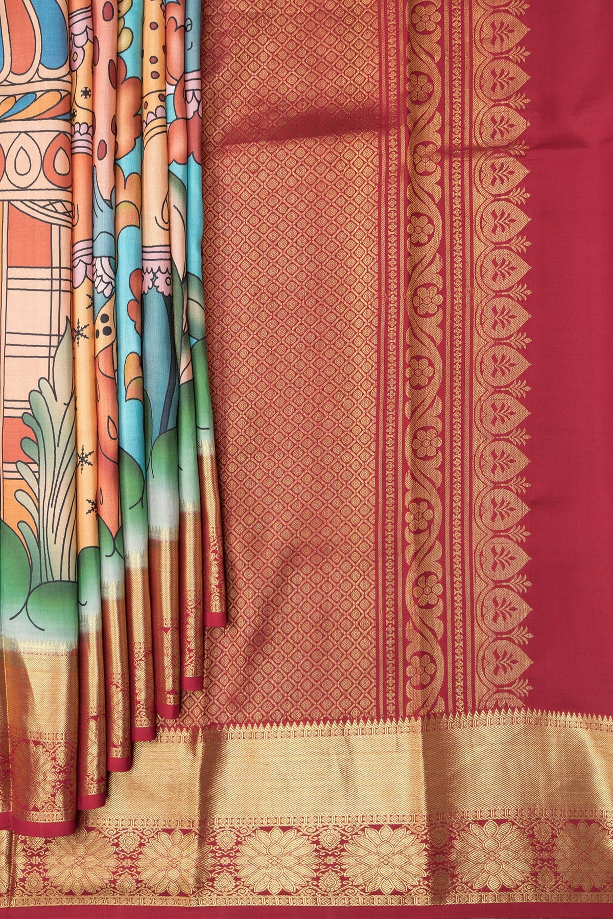 Pleats and pallu of Golden Peach Dual Tone Kanchipuram Silk Saree with Printed design on the body and Zari Border. 