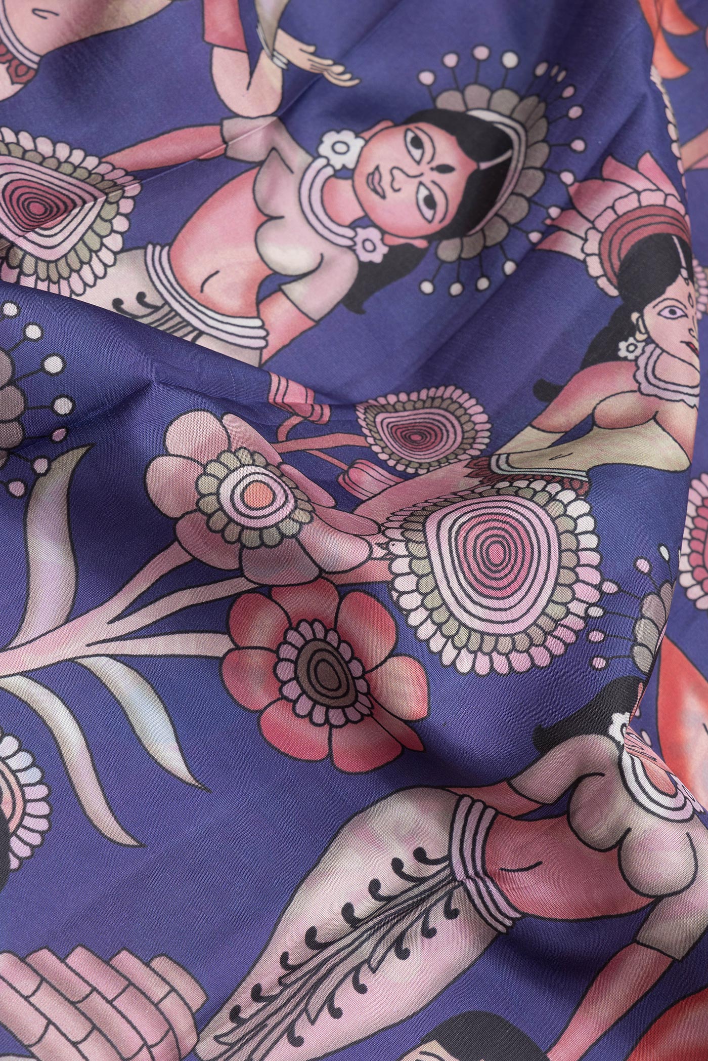 Close up of Navy Blue Dual Tone Kanjivaram Silk Saree with Printed design on the body and Zari Border.  displaying folds