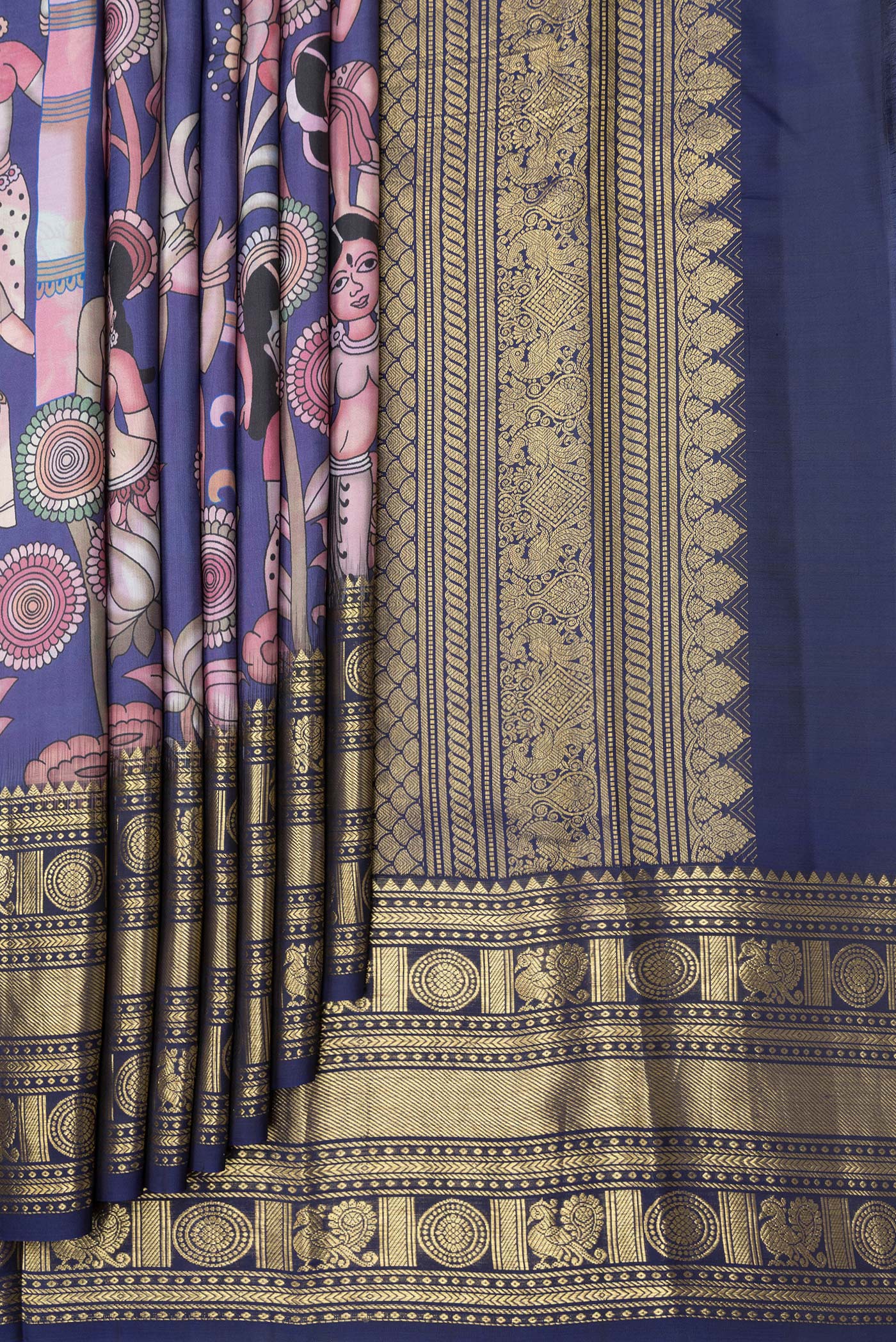 Pleats and pallu of Navy Blue Dual Tone Kanjivaram Silk Saree with Printed design on the body and Zari Border. 