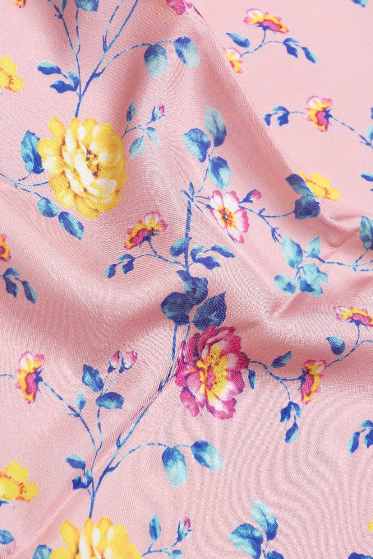 Close up of Pink Dual Tone Tussar Silk Saree with Printed design on the body and Zari Border.  displaying folds