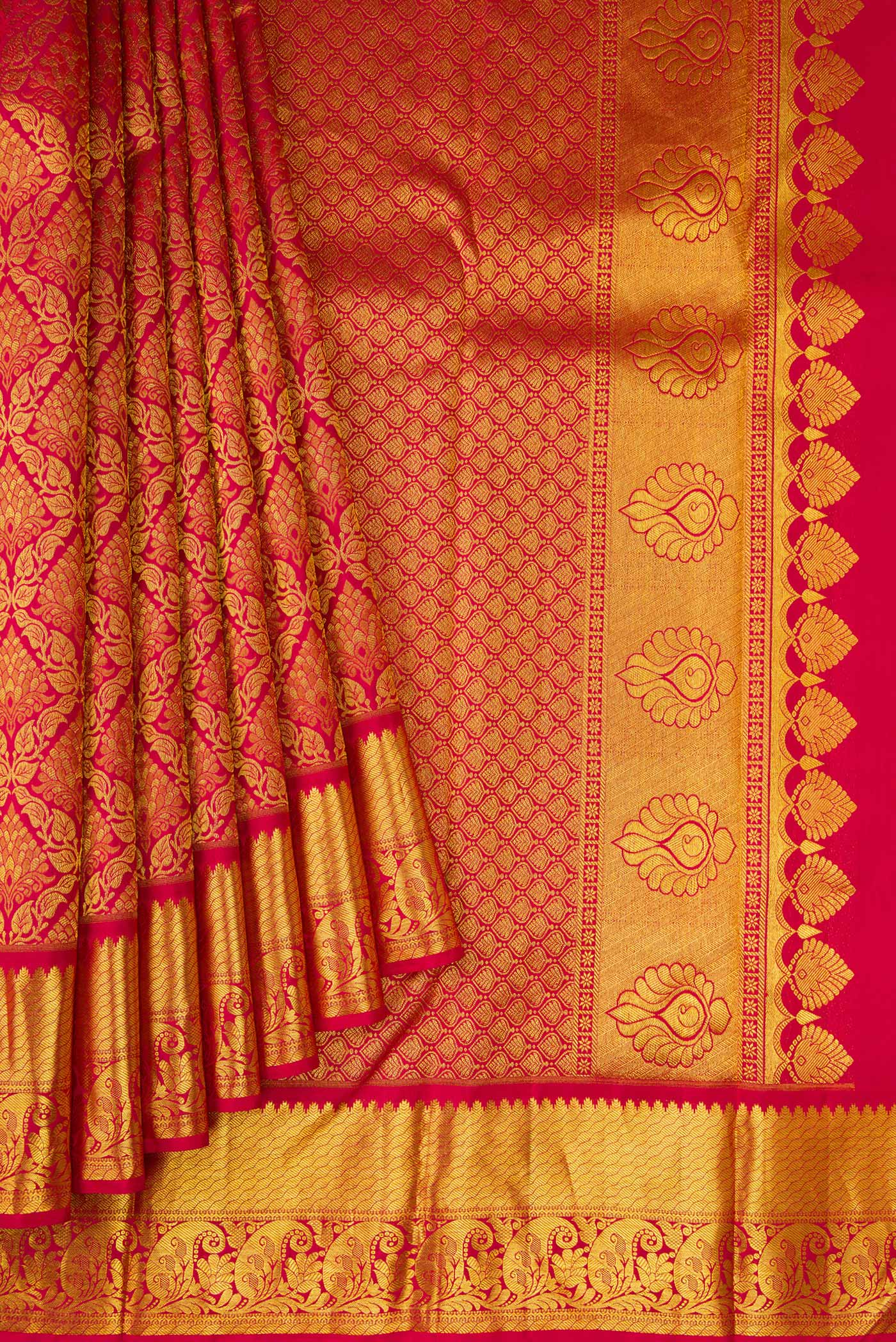 Pleats and pallu of Maroon Dual Tone Kanjivaram Silk Saree with Zari Brocade on the body and Zari Border. 