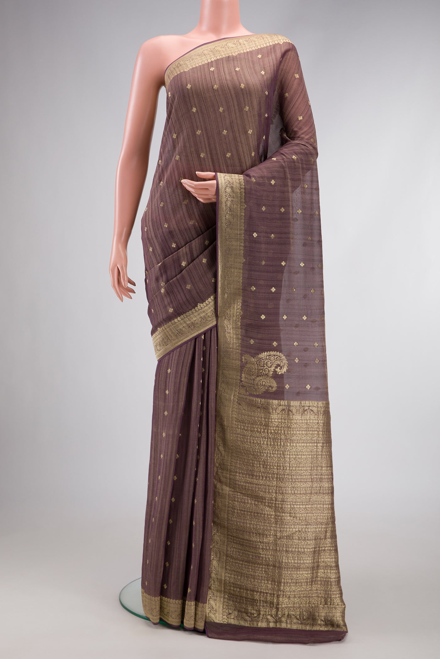 Brown Dual Tone Tussar Silk Saree with Zari Butta on the body and Zari Border.  displayed on a mannequin