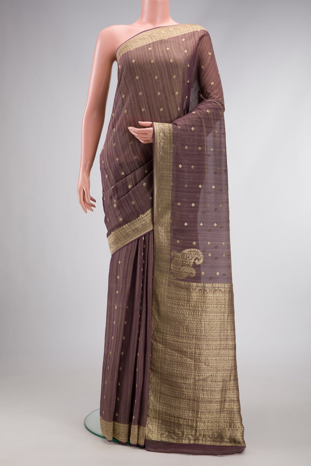 Brown Dual Tone Tussar Silk Saree with Zari Butta on the body and Zari Border.  displayed on a mannequin
