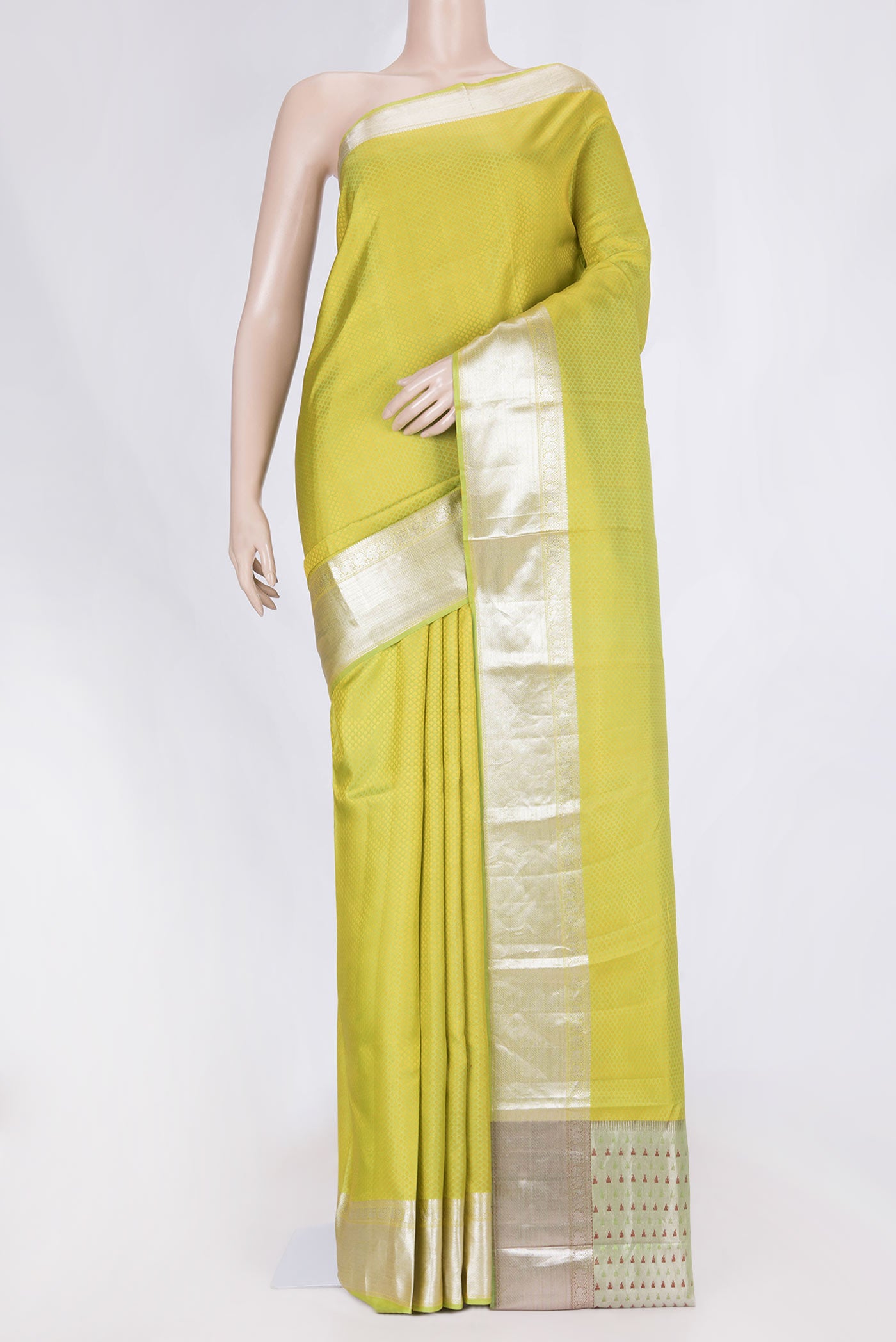 Parrot Green Dual Tone Kanchipuram Saree with Jacquard design on the body and Zari Border displayed on a mannequin