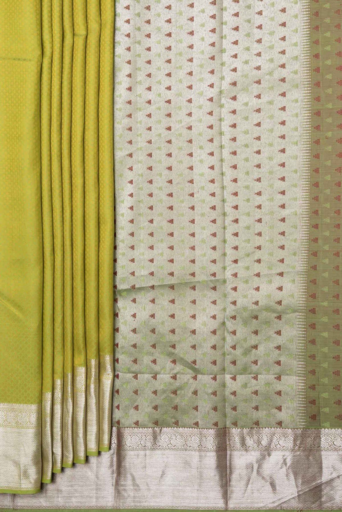 Pleats and pallu of Parrot Green Dual Tone Kanchipuram Saree with Jacquard design on the body and Zari Border