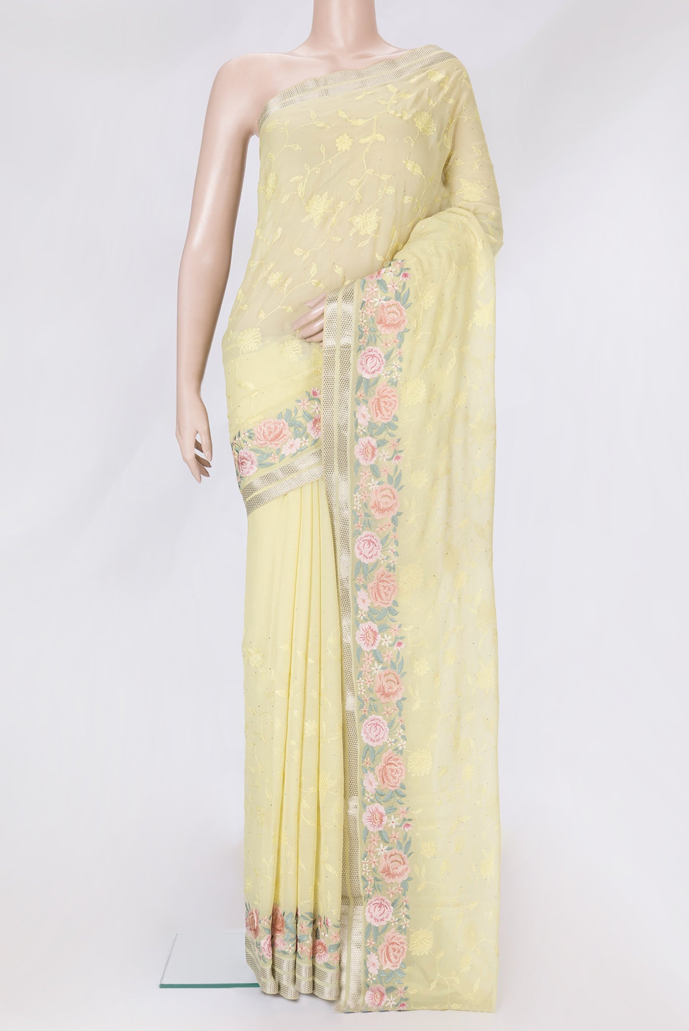 Lemon Yellow Dual Tone Mysore Chiffon Saree with Embroidery on the body and Embroidery Border.  displayed on a mannequin
