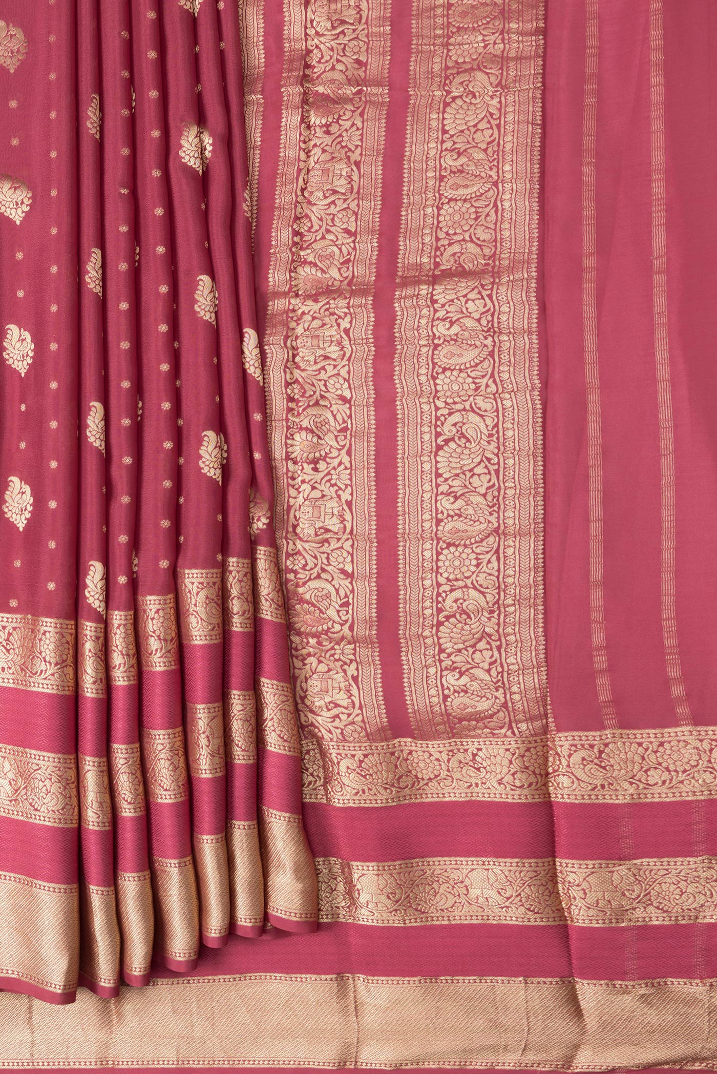 Pleats and pallu of Pink Dual Tone Mysore Georgette Saree with Zari Butta on the body and Zari Border. 