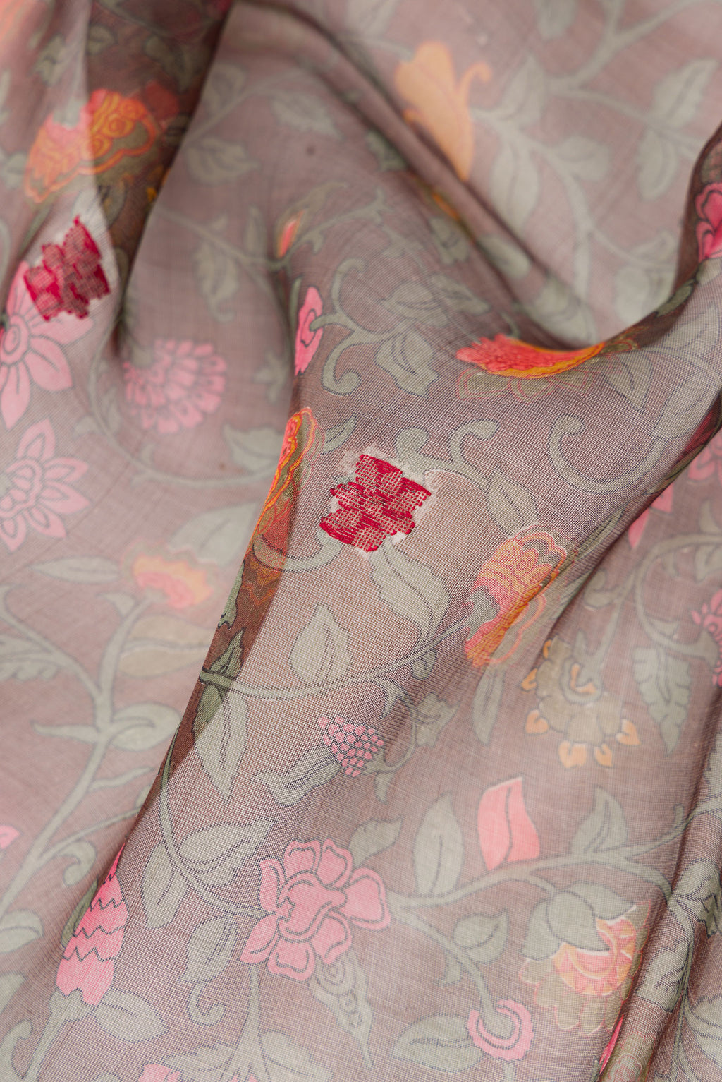 Close up of Bottle Green Dual Tone Organza Silk Saree with Printed design on the body and Thread Border.  displaying folds