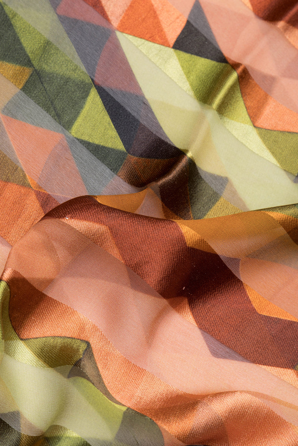Close up of Multi Color Crepe Saree with Geometric Print on the body and Thread Border.  displaying folds